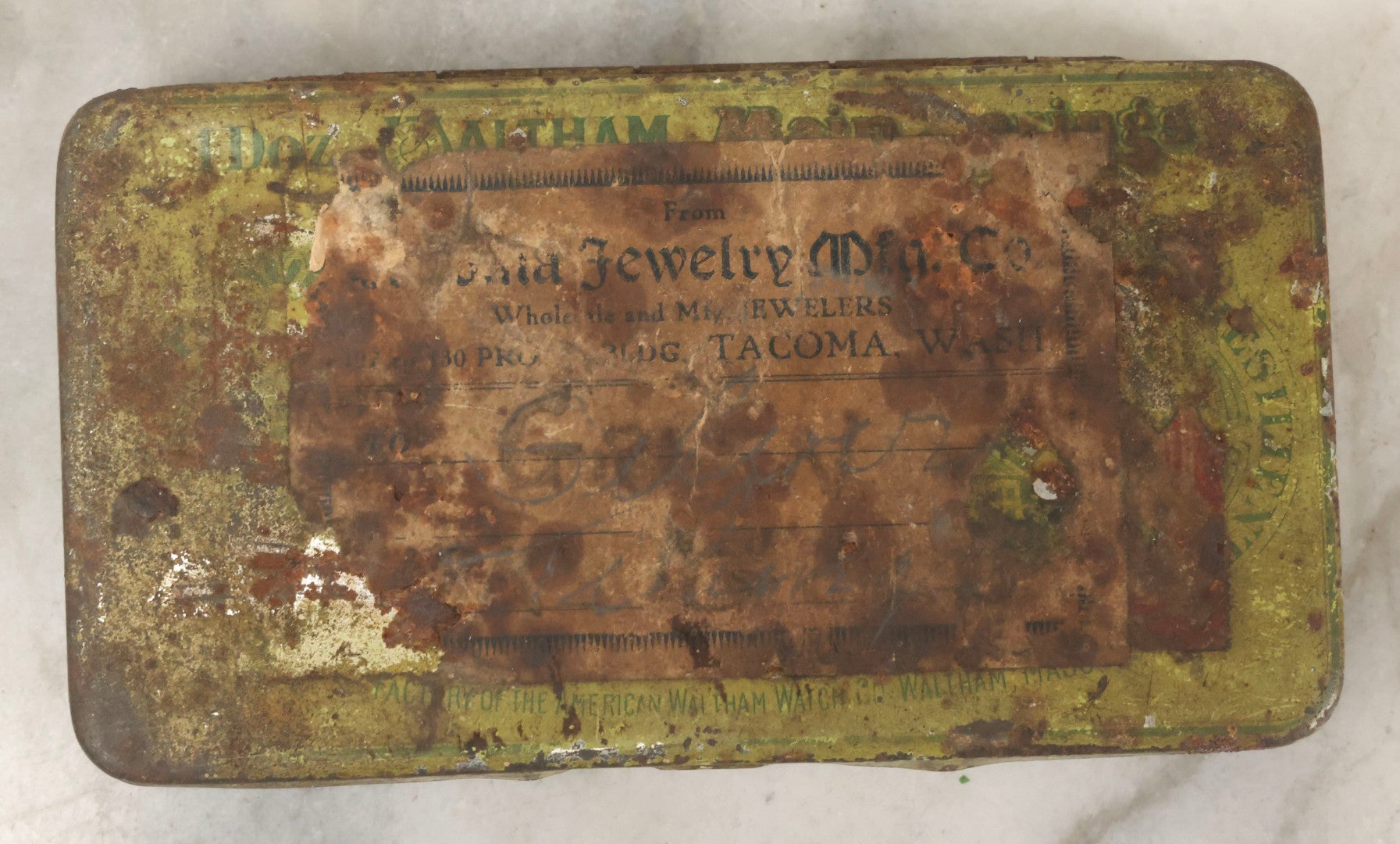 Lot 123 - Grouping Of Six Antique Watchmakers Mainspring Parts Tins Including Waltham, M. Myers, Elgin National, And Meyer Jewelry Co.
