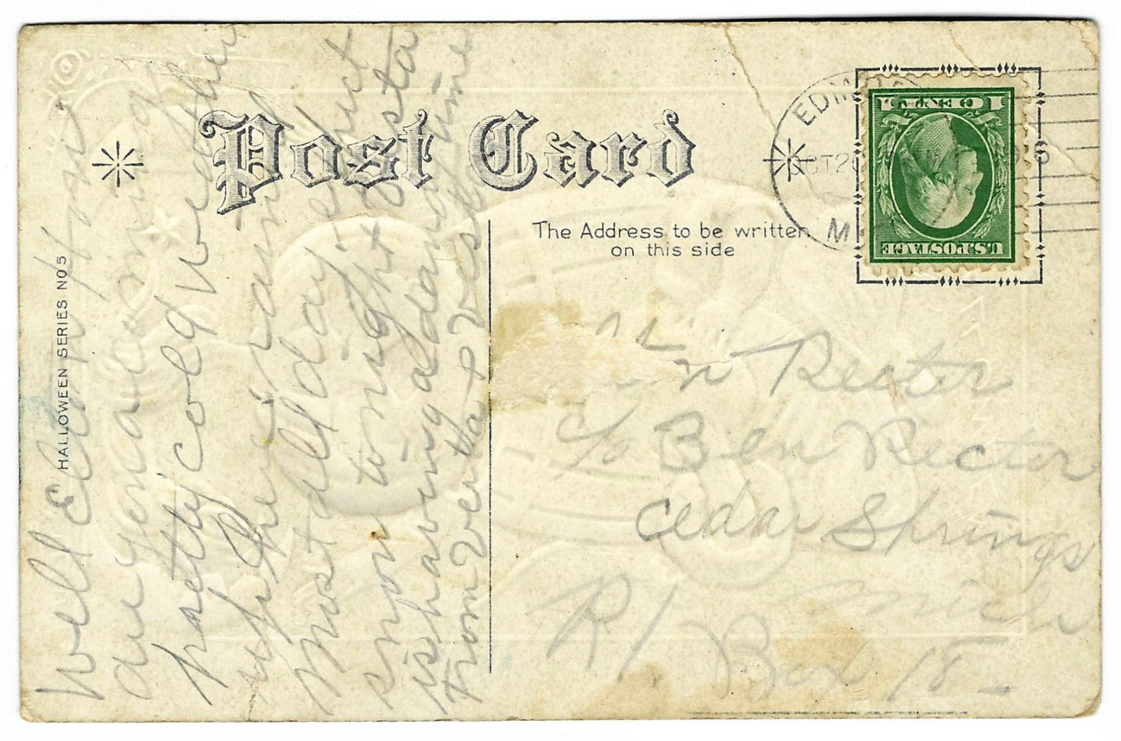 Lot 130 - Antique Embossed Gold-Accented Hallowe'en Postcard Depicting Jack-O-Lantern Costume Emerging From Barrel Behind Girl And Black Cat, Hallowe'en Series No. 5, Postmarked, Written On Verso