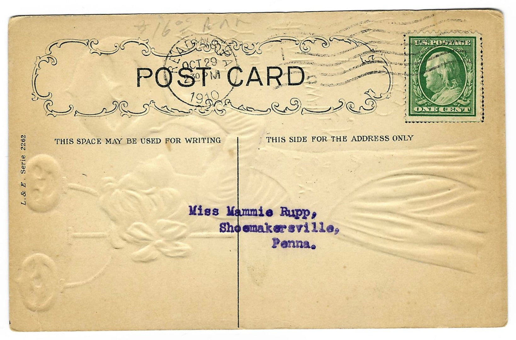 Lot 132 - Antique Embossed Hallowe'en Postcard “May Your Hallowe'en Be Merry” Depicting Woman Holding Jack-O-Lantern Beside Pumpkins On Candelabra, L. & E. Serie 2262, Reading, Pennsylvania, 1910, Addressed To Shoemakersville, Pennsylvania