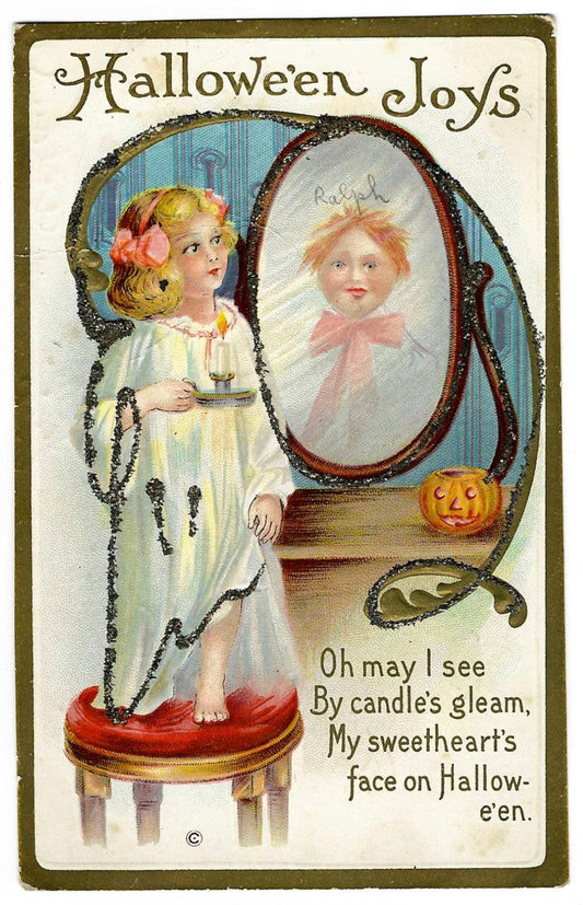 Lot 134 - Antique Embossed Glitter Hallowe'en Postcard “Hallowe'en Joys” Depicting Girl With Candle Before Mirror, “Ralph” Written In Reflection, Series 226A, Not Postmarked, Addressed To Cleveland, Ohio