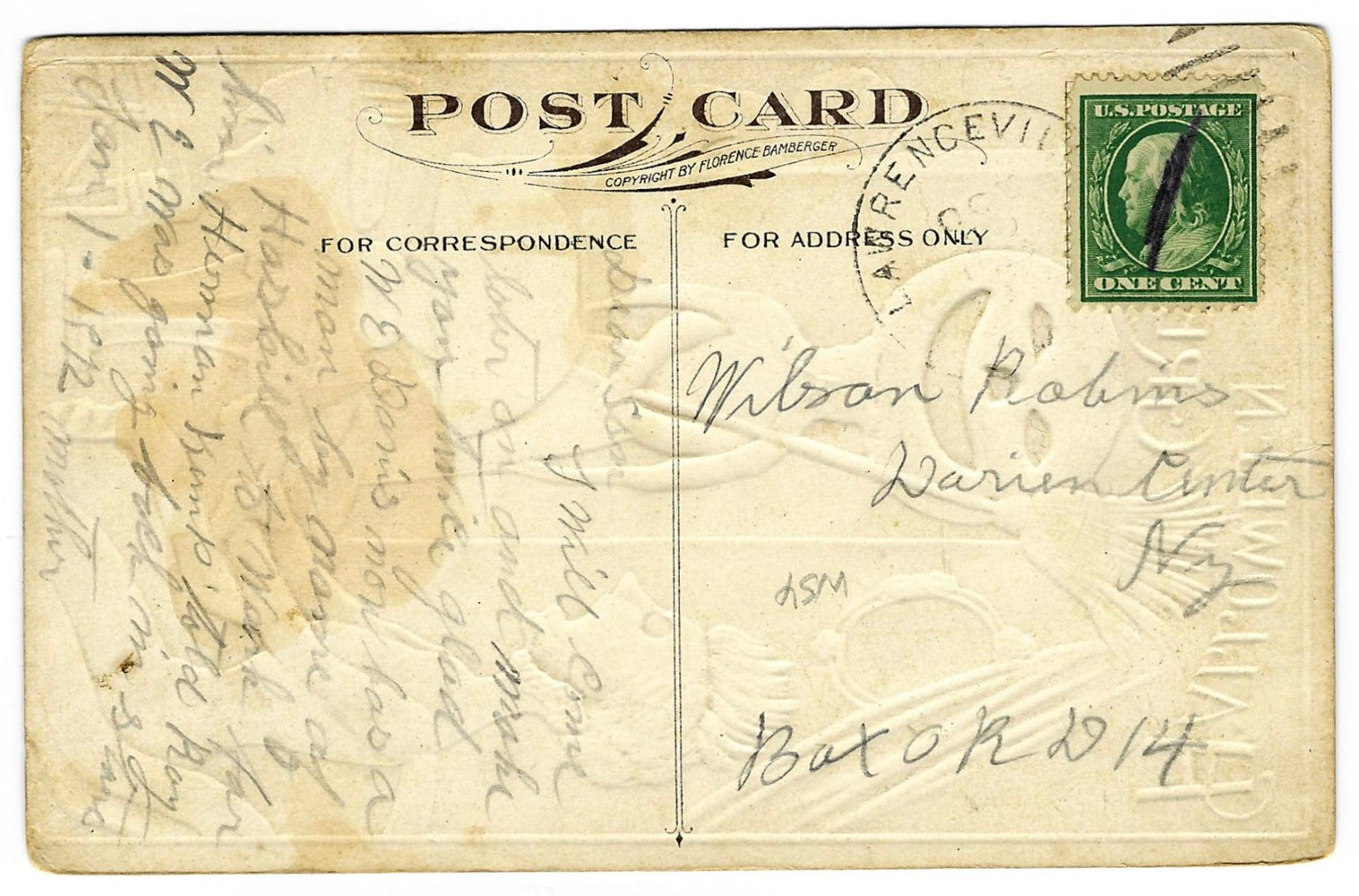 Lot 136 - Antique Embossed Hallowe'en Postcard “Hallowe'en Greetings” Depicting Woman At Table Surprised By Ghost With Jack-O-Lantern Head And Broom, Copyright Florence Bamberger, Postmarked Lawrenceville, Illinois, Written On Verso