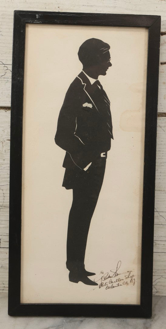 Lot 138 - Antique Hand-Cut Paper Silhouette Of Man In Suit With Tie, Hands In Pockets, By Beatrix Sherman, Ritz-Carlton Shop, Atlantic City, New Jersey, Circa 1930, 6-1/4" x 12-3/4"