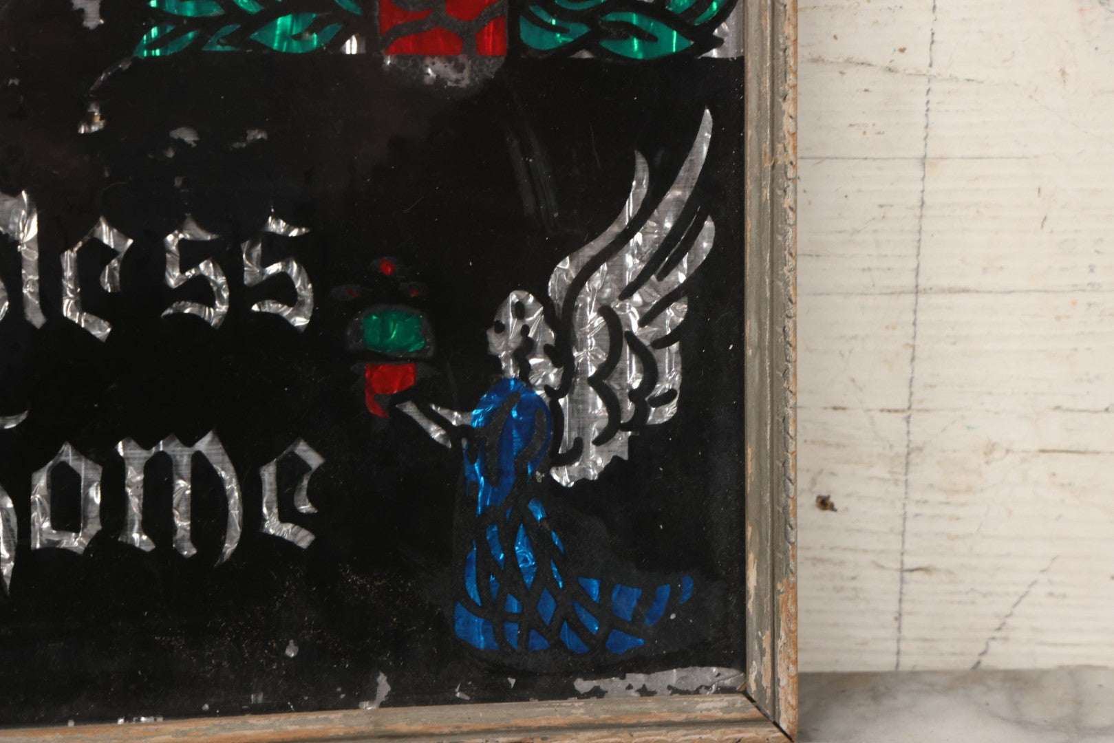 Lot 139 - Vintage Reverse Glass Tinsel Painting "God Bless Our Home" With Sacred Heart, Angels, And Candles, 16-3/4" x 12-3/4"