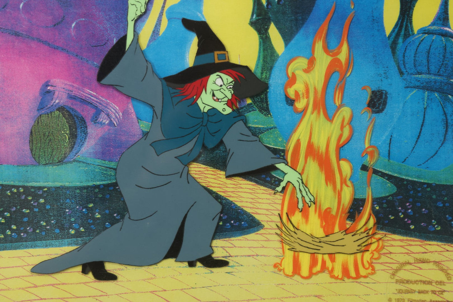 Lot 140 - Vintage Original Hand-Painted Animation Production Cel Featuring Mombi The Witch Conjuring Fire From "Journey Back To Oz," Filmation Associates, 1972, With Certificate Of Authenticity, 18-1/4" x 25-1/4"