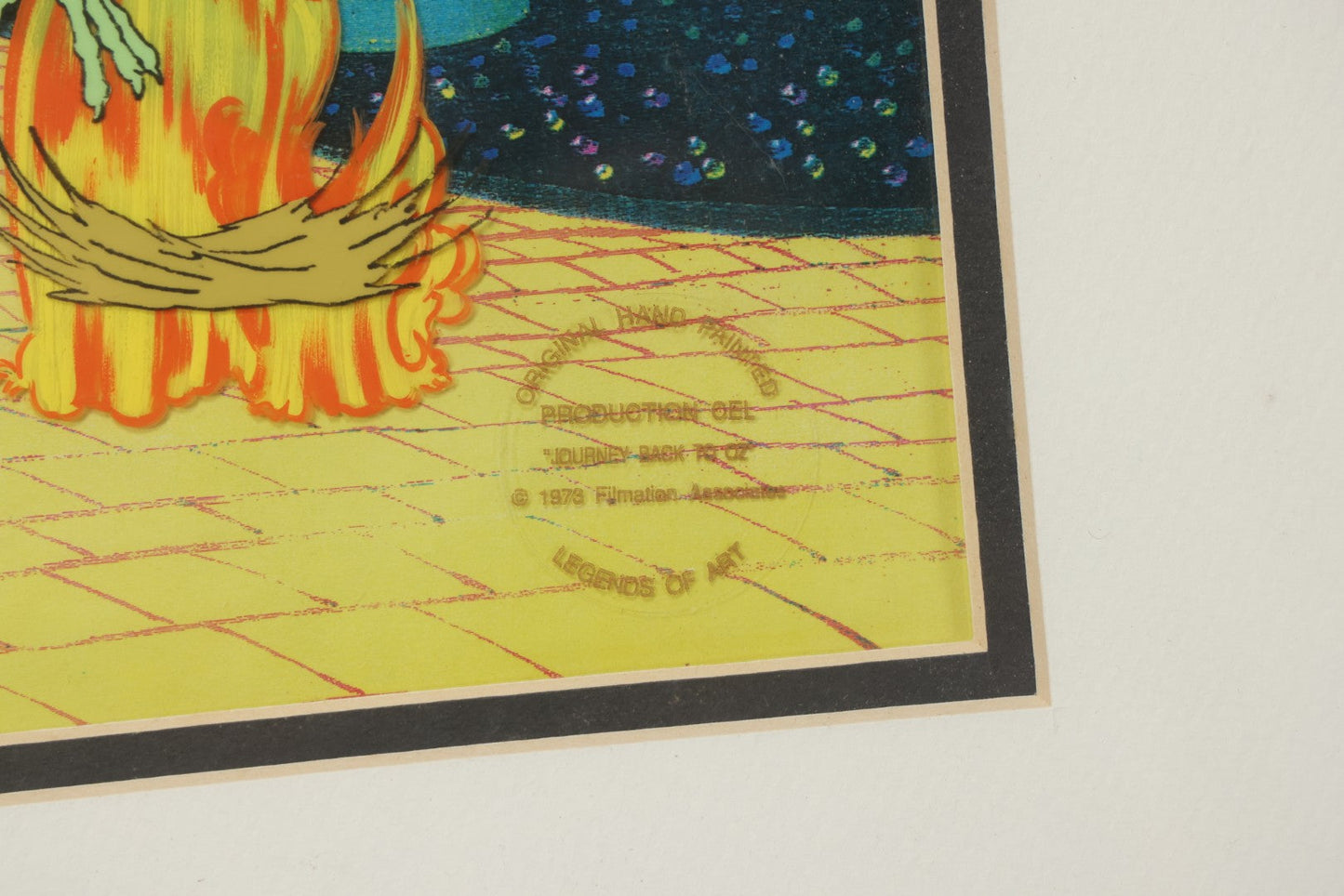 Lot 140 - Vintage Original Hand-Painted Animation Production Cel Featuring Mombi The Witch Conjuring Fire From "Journey Back To Oz," Filmation Associates, 1972, With Certificate Of Authenticity, 18-1/4" x 25-1/4"