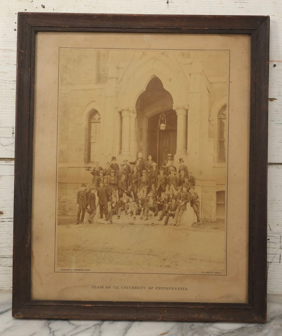 Lot 154 - Antique Boarded Photograph Of The Men Of The Class Of 1873, University Of Pennsylvania, Posed On The Steps Of College Hall, Photographed By Suddards & Fennemore, Philadelphia, Framed, 14-5/8" x 17-5/8"