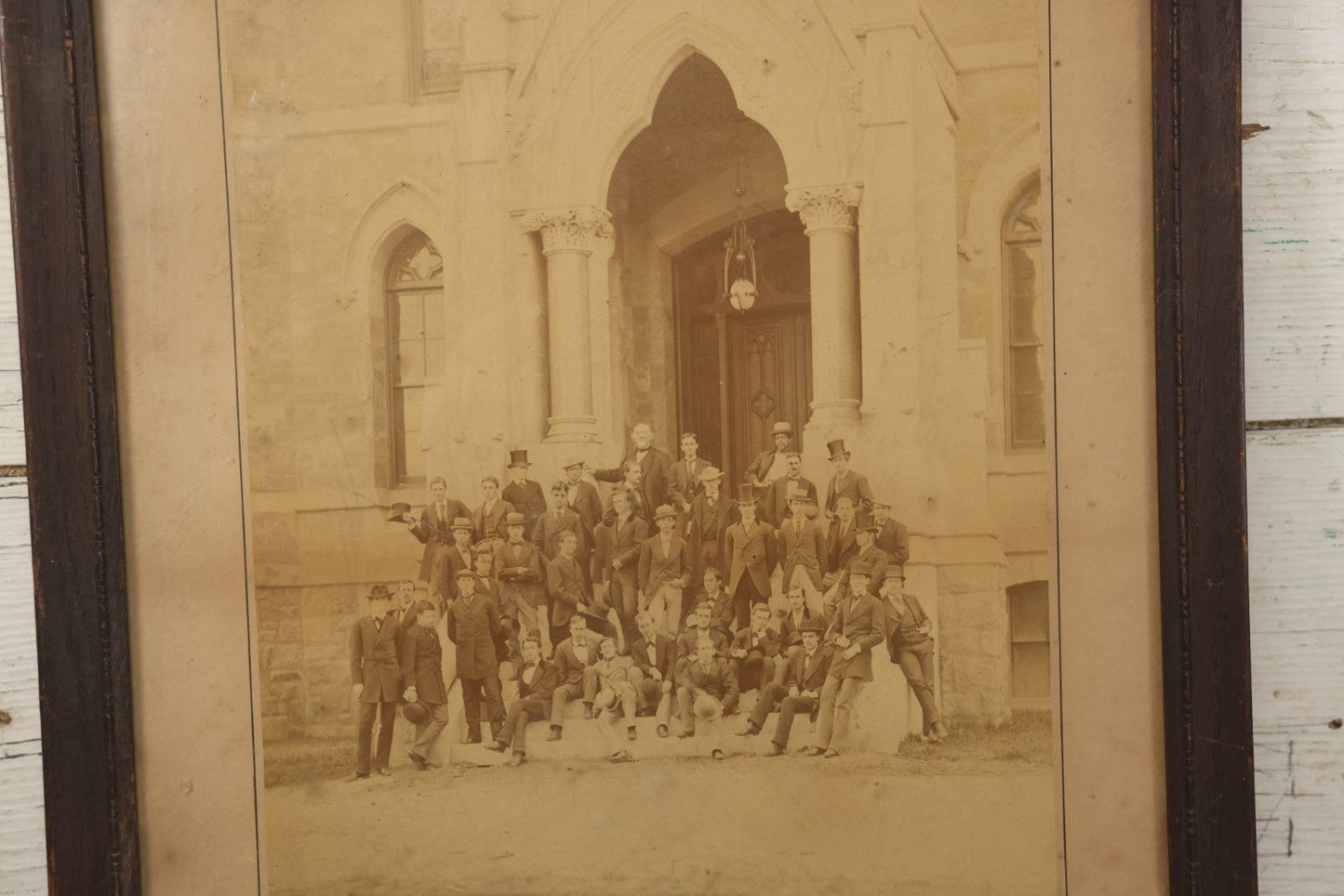 Lot 154 - Antique Boarded Photograph Of The Men Of The Class Of 1873, University Of Pennsylvania, Posed On The Steps Of College Hall, Photographed By Suddards & Fennemore, Philadelphia, Framed, 14-5/8" x 17-5/8"