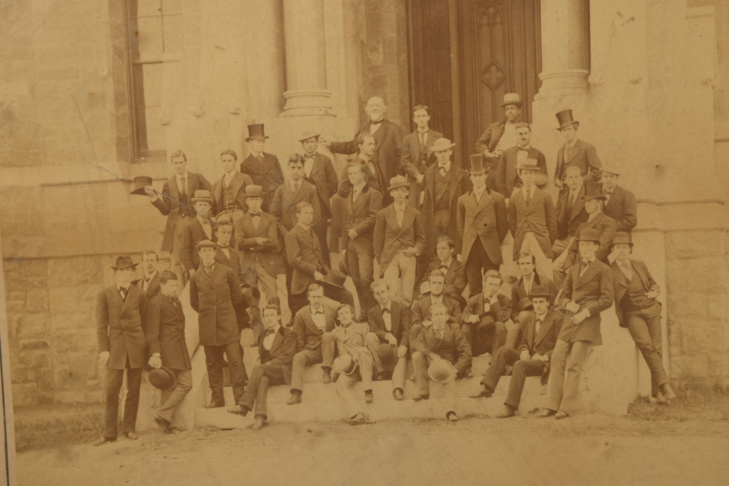 Lot 154 - Antique Boarded Photograph Of The Men Of The Class Of 1873, University Of Pennsylvania, Posed On The Steps Of College Hall, Photographed By Suddards & Fennemore, Philadelphia, Framed, 14-5/8" x 17-5/8"