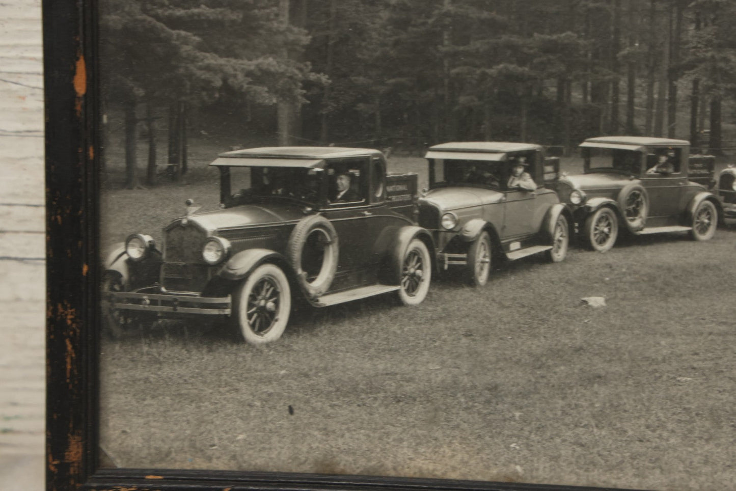 Lot 157 - Antique Photograph Of Early Automobiles Carrying “National Register” Crates, Signed Clark, Framed By Geo. E. Chalmers Co., Rutland, Vermont, Framed, 10" x 8"