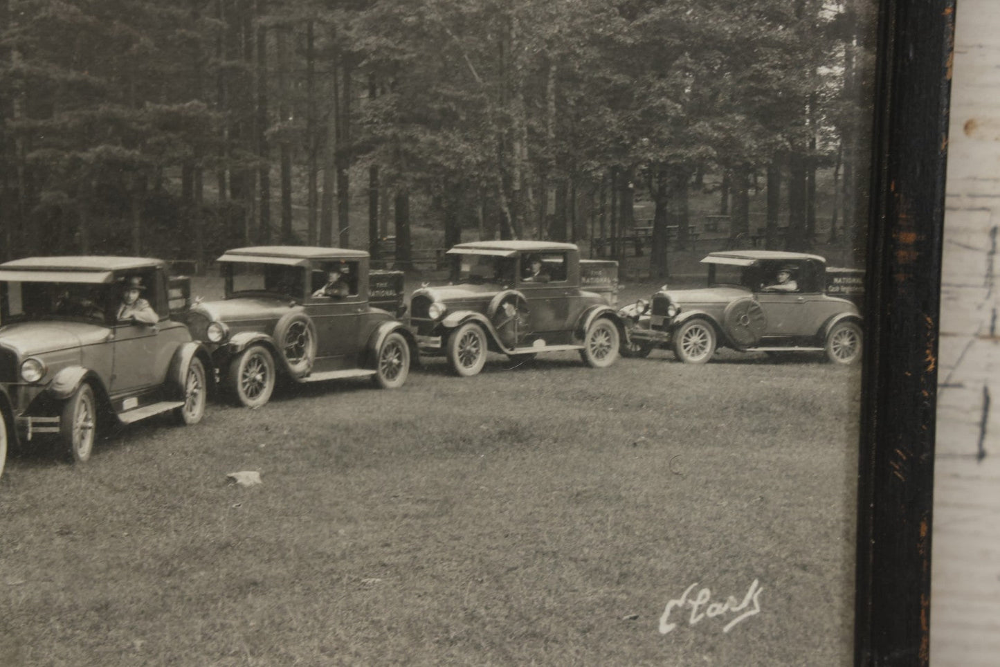 Lot 157 - Antique Photograph Of Early Automobiles Carrying “National Register” Crates, Signed Clark, Framed By Geo. E. Chalmers Co., Rutland, Vermont, Framed, 10" x 8"