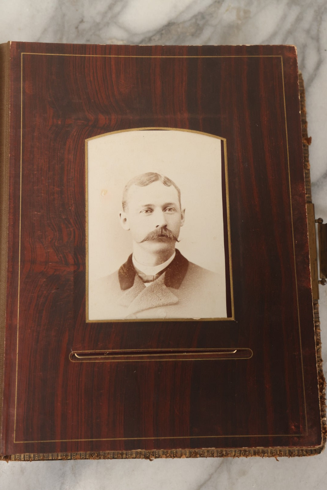 Lot 159 - Antique Victorian Family Photo Album With Brown Leather Covers And Brass Clasp Containing 18 Cabinet Cards, 13 Carte De Visite CDV Photographs, 9 Tintypes, And 4 Long Cabinet Cards Including Hidden Mother And Black Baby Portraits