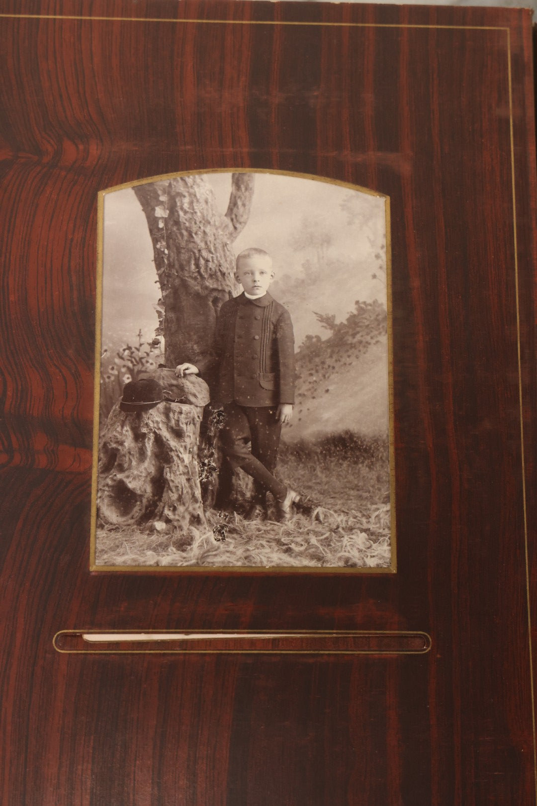 Lot 159 - Antique Victorian Family Photo Album With Brown Leather Covers And Brass Clasp Containing 18 Cabinet Cards, 13 Carte De Visite CDV Photographs, 9 Tintypes, And 4 Long Cabinet Cards Including Hidden Mother And Black Baby Portraits