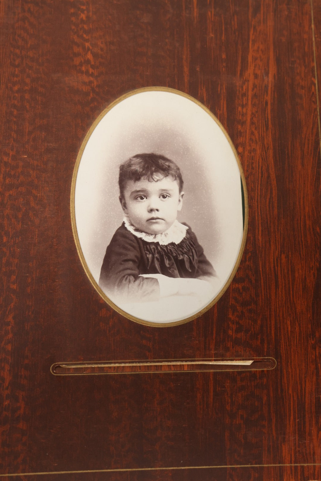 Lot 159 - Antique Victorian Family Photo Album With Brown Leather Covers And Brass Clasp Containing 18 Cabinet Cards, 13 Carte De Visite CDV Photographs, 9 Tintypes, And 4 Long Cabinet Cards Including Hidden Mother And Black Baby Portraits