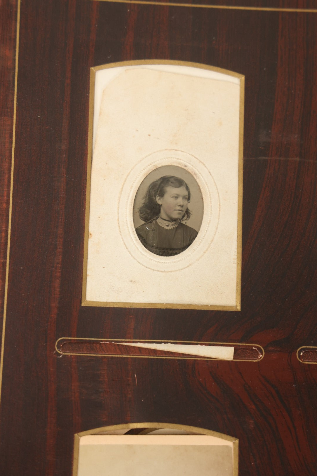 Lot 159 - Antique Victorian Family Photo Album With Brown Leather Covers And Brass Clasp Containing 18 Cabinet Cards, 13 Carte De Visite CDV Photographs, 9 Tintypes, And 4 Long Cabinet Cards Including Hidden Mother And Black Baby Portraits