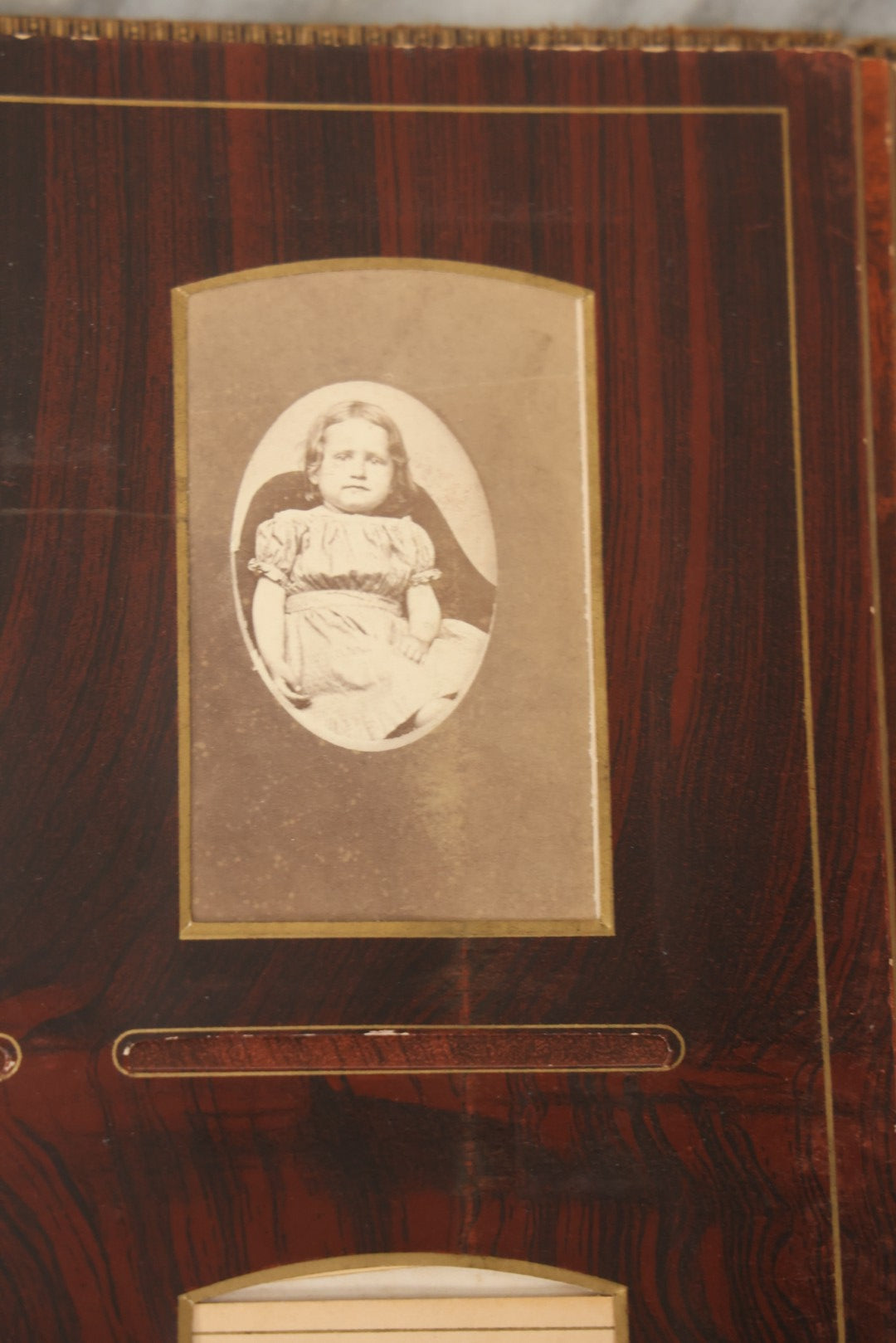 Lot 159 - Antique Victorian Family Photo Album With Brown Leather Covers And Brass Clasp Containing 18 Cabinet Cards, 13 Carte De Visite CDV Photographs, 9 Tintypes, And 4 Long Cabinet Cards Including Hidden Mother And Black Baby Portraits