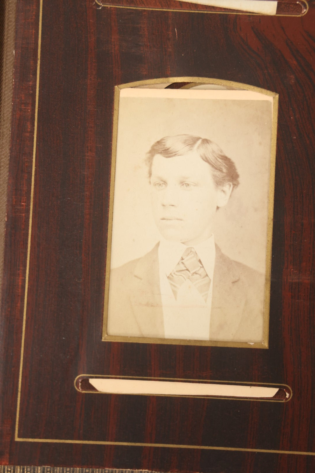 Lot 159 - Antique Victorian Family Photo Album With Brown Leather Covers And Brass Clasp Containing 18 Cabinet Cards, 13 Carte De Visite CDV Photographs, 9 Tintypes, And 4 Long Cabinet Cards Including Hidden Mother And Black Baby Portraits