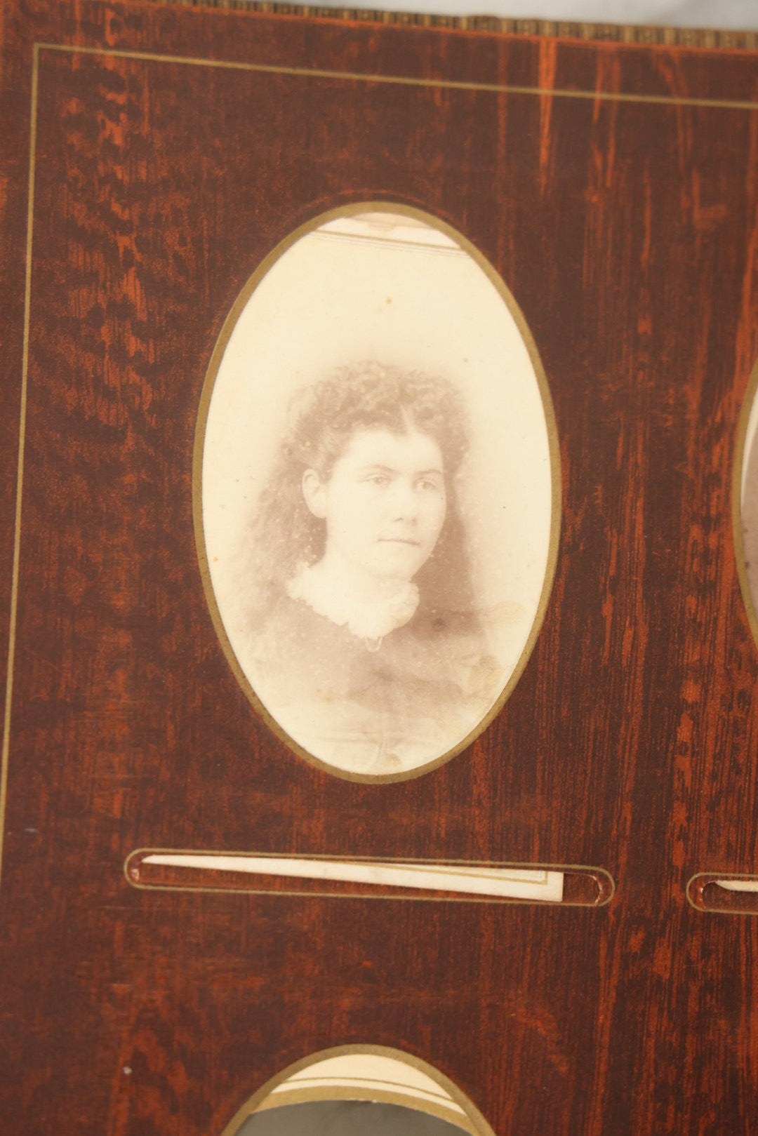 Lot 159 - Antique Victorian Family Photo Album With Brown Leather Covers And Brass Clasp Containing 18 Cabinet Cards, 13 Carte De Visite CDV Photographs, 9 Tintypes, And 4 Long Cabinet Cards Including Hidden Mother And Black Baby Portraits