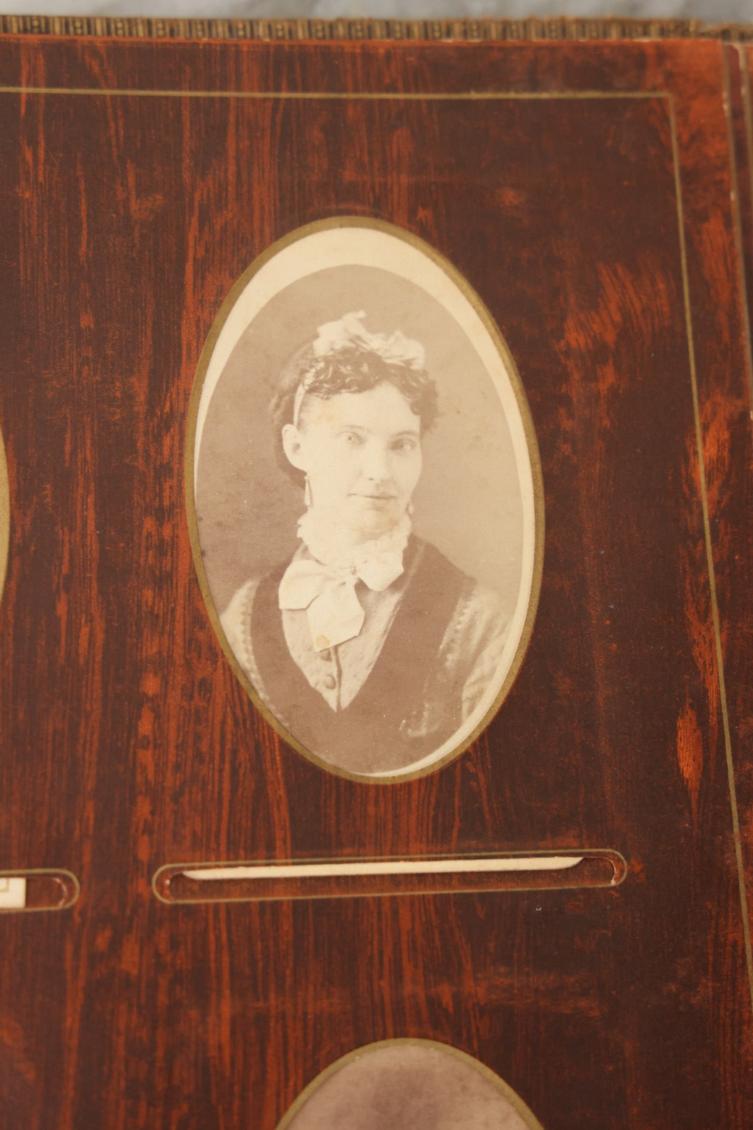 Lot 159 - Antique Victorian Family Photo Album With Brown Leather Covers And Brass Clasp Containing 18 Cabinet Cards, 13 Carte De Visite CDV Photographs, 9 Tintypes, And 4 Long Cabinet Cards Including Hidden Mother And Black Baby Portraits