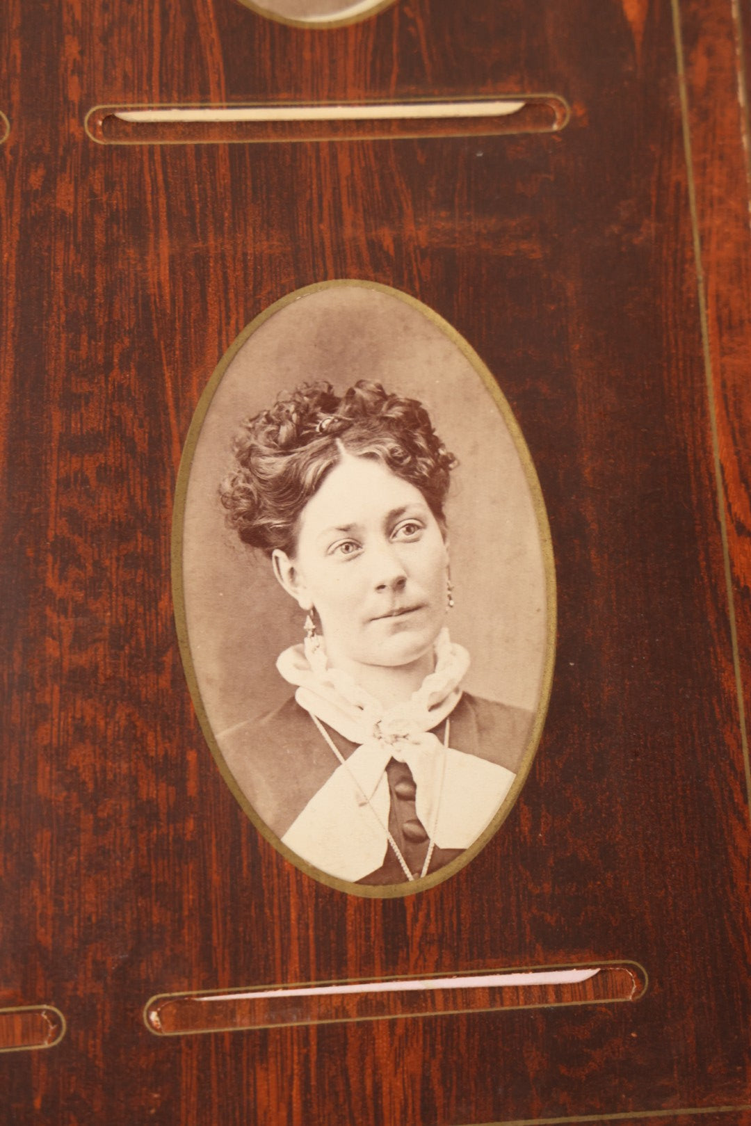 Lot 159 - Antique Victorian Family Photo Album With Brown Leather Covers And Brass Clasp Containing 18 Cabinet Cards, 13 Carte De Visite CDV Photographs, 9 Tintypes, And 4 Long Cabinet Cards Including Hidden Mother And Black Baby Portraits