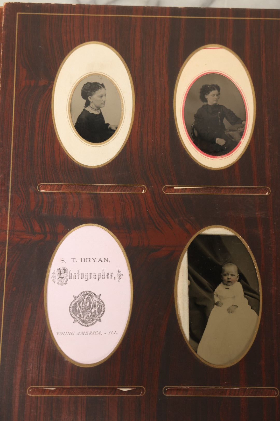 Lot 159 - Antique Victorian Family Photo Album With Brown Leather Covers And Brass Clasp Containing 18 Cabinet Cards, 13 Carte De Visite CDV Photographs, 9 Tintypes, And 4 Long Cabinet Cards Including Hidden Mother And Black Baby Portraits