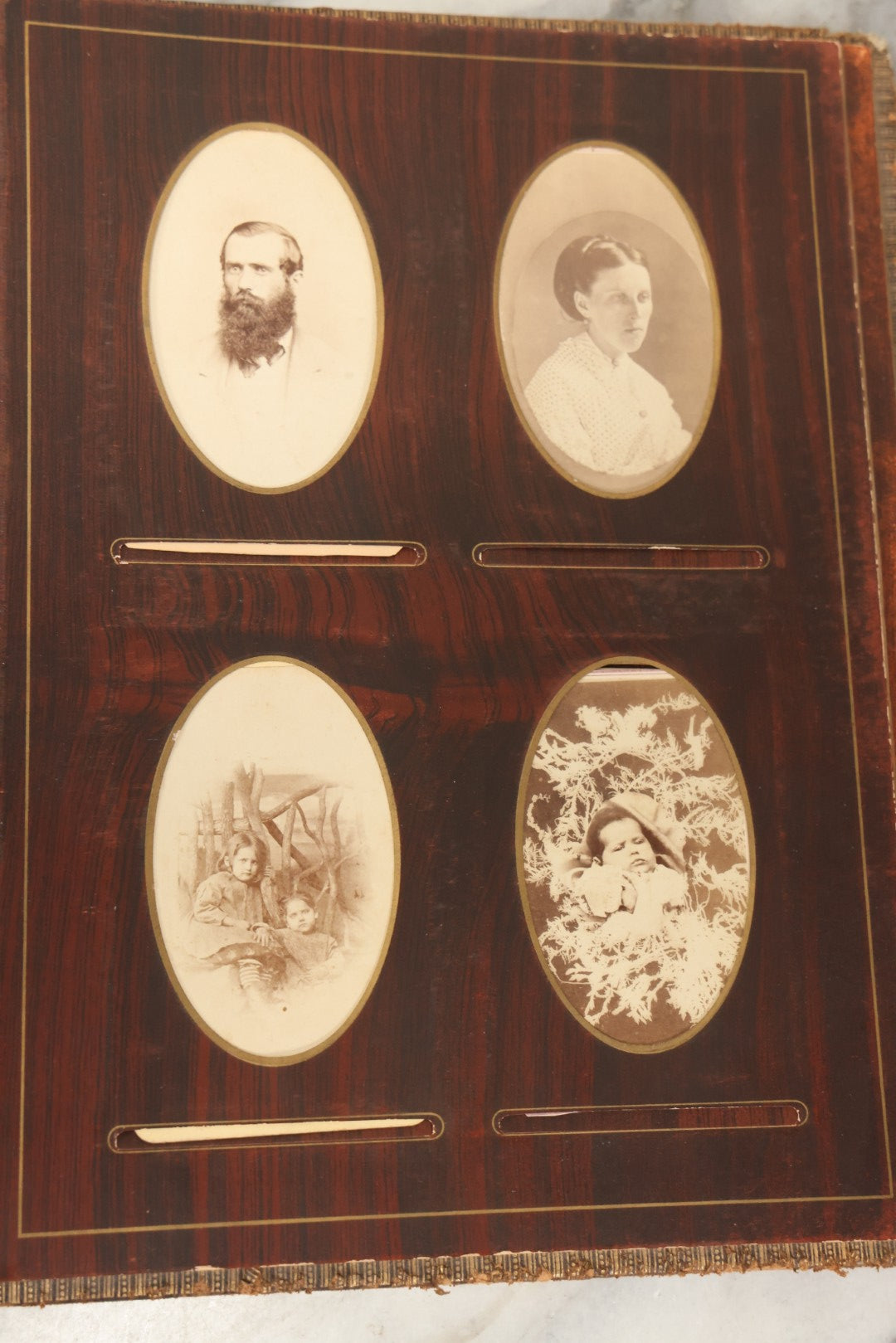 Lot 159 - Antique Victorian Family Photo Album With Brown Leather Covers And Brass Clasp Containing 18 Cabinet Cards, 13 Carte De Visite CDV Photographs, 9 Tintypes, And 4 Long Cabinet Cards Including Hidden Mother And Black Baby Portraits