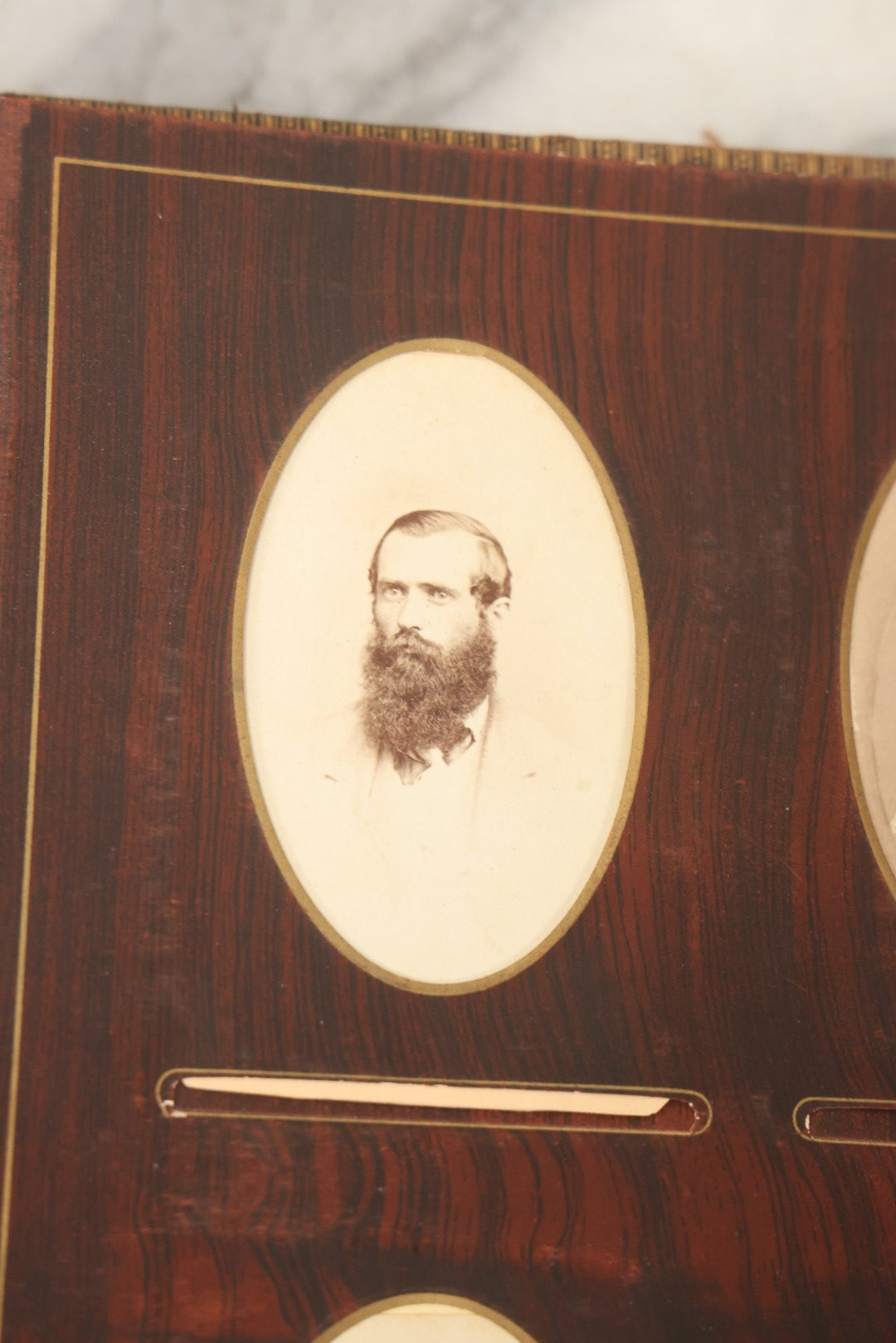 Lot 159 - Antique Victorian Family Photo Album With Brown Leather Covers And Brass Clasp Containing 18 Cabinet Cards, 13 Carte De Visite CDV Photographs, 9 Tintypes, And 4 Long Cabinet Cards Including Hidden Mother And Black Baby Portraits