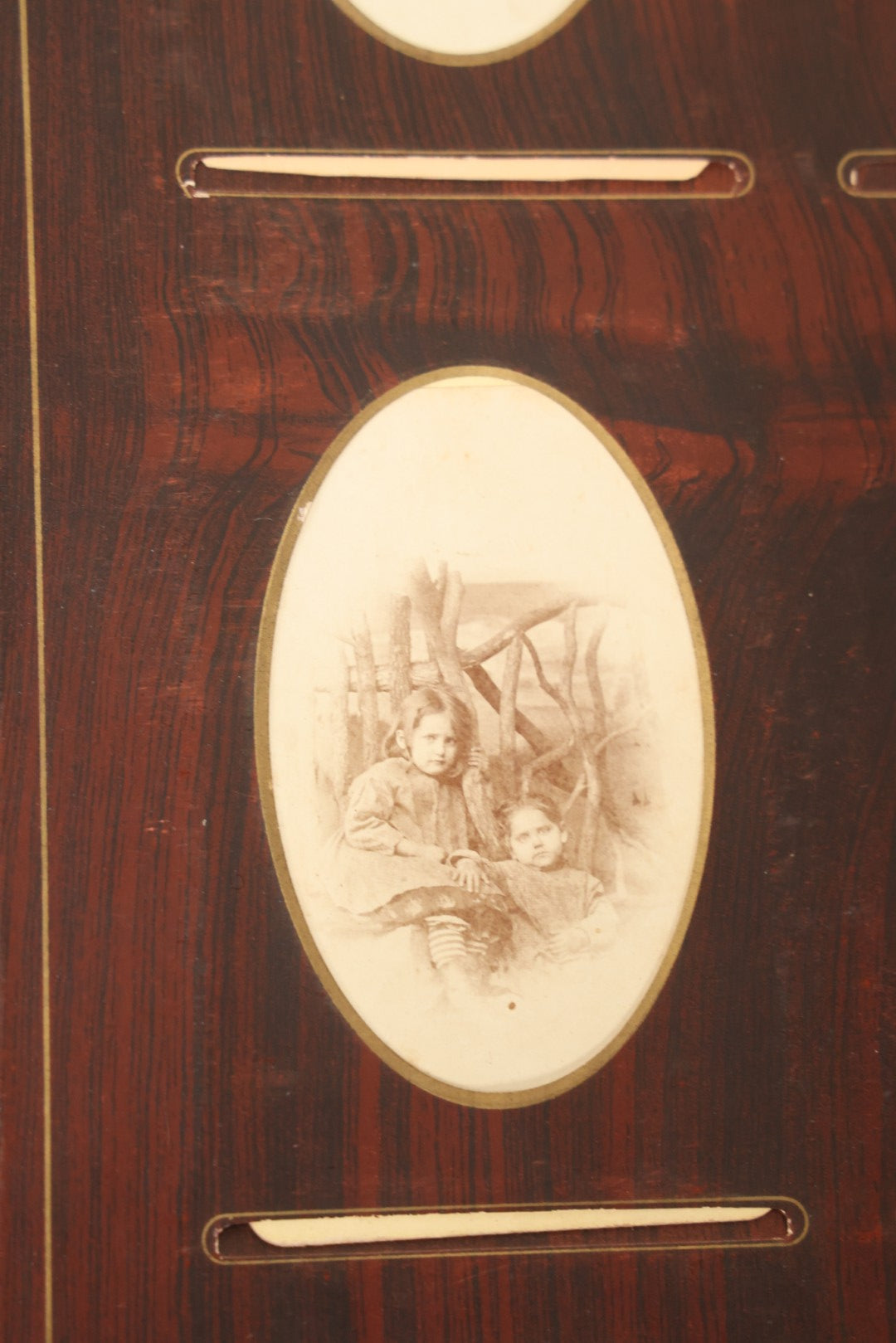 Lot 159 - Antique Victorian Family Photo Album With Brown Leather Covers And Brass Clasp Containing 18 Cabinet Cards, 13 Carte De Visite CDV Photographs, 9 Tintypes, And 4 Long Cabinet Cards Including Hidden Mother And Black Baby Portraits