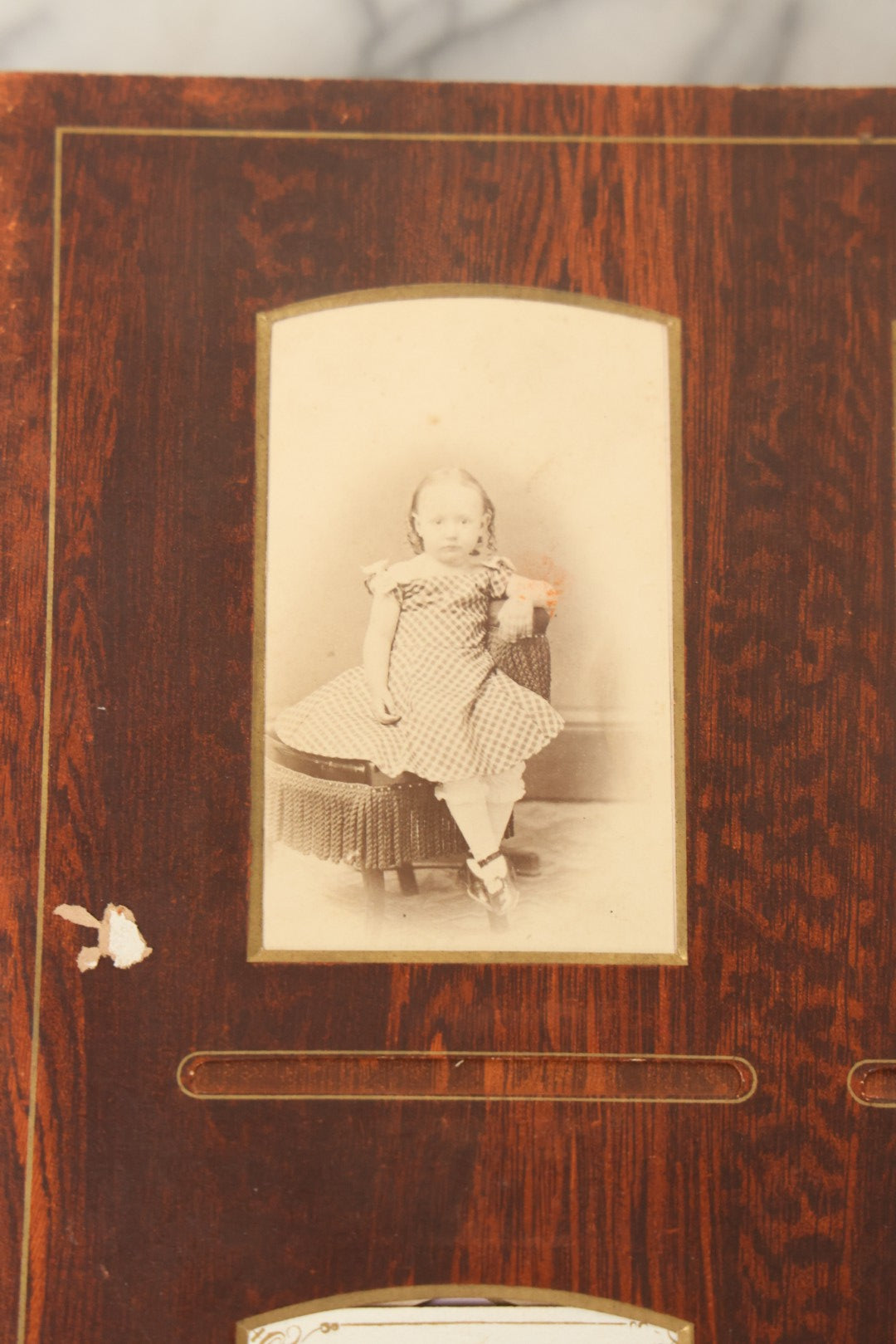 Lot 159 - Antique Victorian Family Photo Album With Brown Leather Covers And Brass Clasp Containing 18 Cabinet Cards, 13 Carte De Visite CDV Photographs, 9 Tintypes, And 4 Long Cabinet Cards Including Hidden Mother And Black Baby Portraits