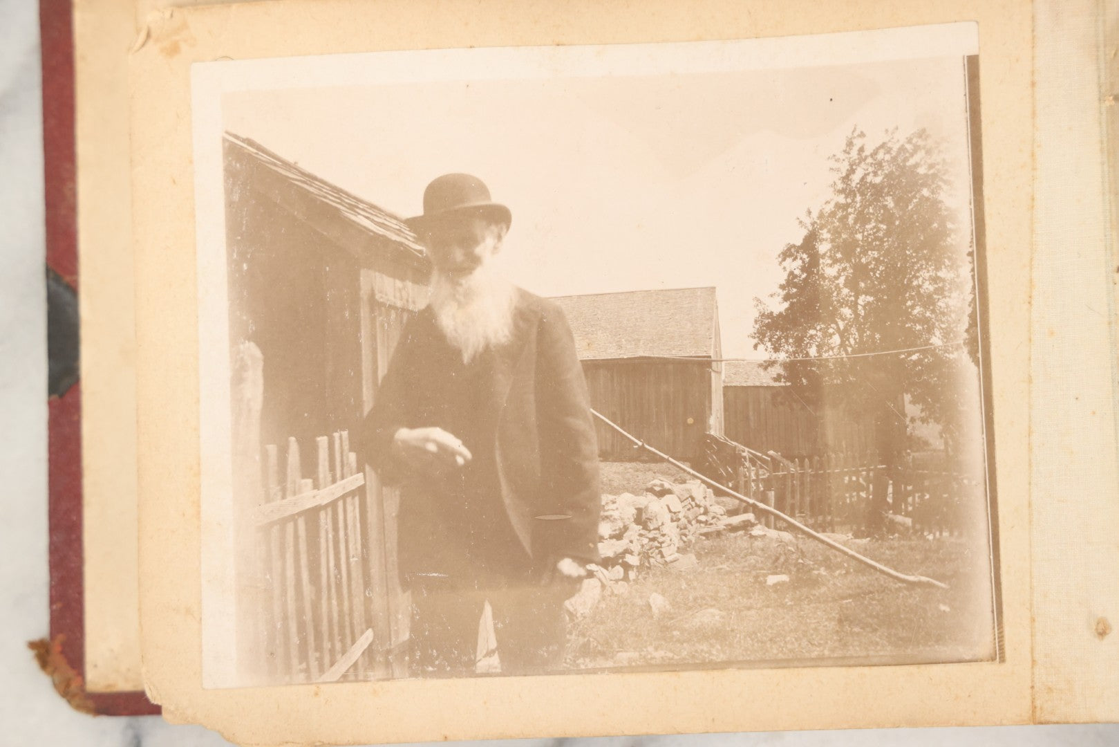 Lot 160 - Antique Snapshot Photo Album With Nineteen Photographs Including Men With Bicycles, Women At Beach, Dog Photos, And Family Memorial, Badger Plain Leaf Album No. 701 By Heinn Specialty Co., Milwaukee, Wisconsin, Circa 1895