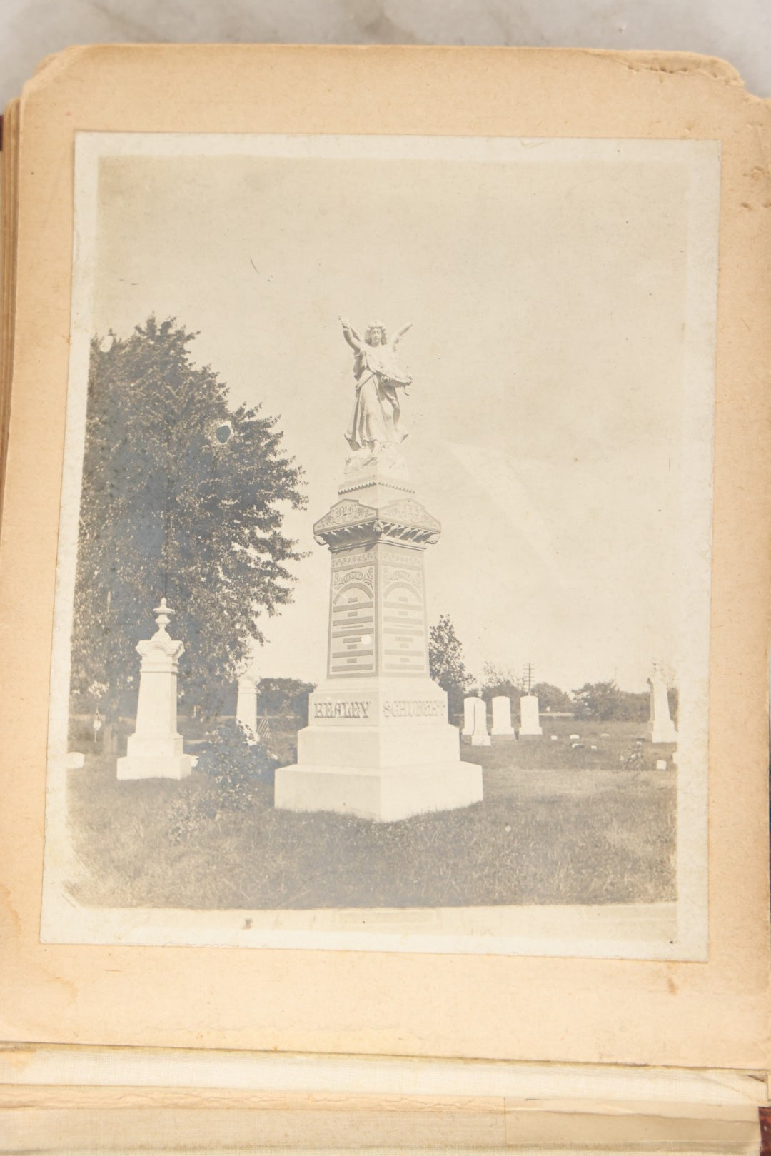 Lot 160 - Antique Snapshot Photo Album With Nineteen Photographs Including Men With Bicycles, Women At Beach, Dog Photos, And Family Memorial, Badger Plain Leaf Album No. 701 By Heinn Specialty Co., Milwaukee, Wisconsin, Circa 1895