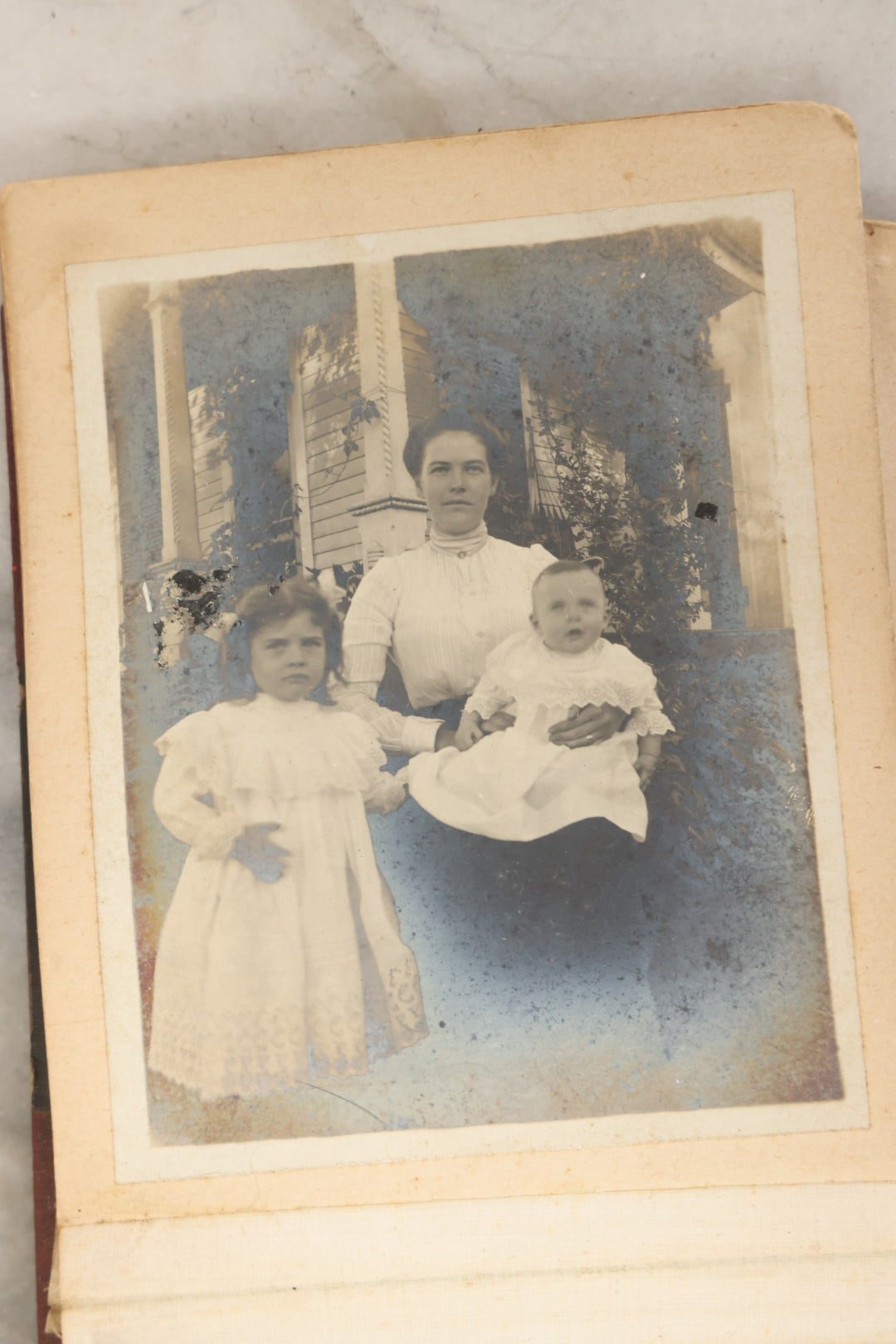 Lot 160 - Antique Snapshot Photo Album With Nineteen Photographs Including Men With Bicycles, Women At Beach, Dog Photos, And Family Memorial, Badger Plain Leaf Album No. 701 By Heinn Specialty Co., Milwaukee, Wisconsin, Circa 1895