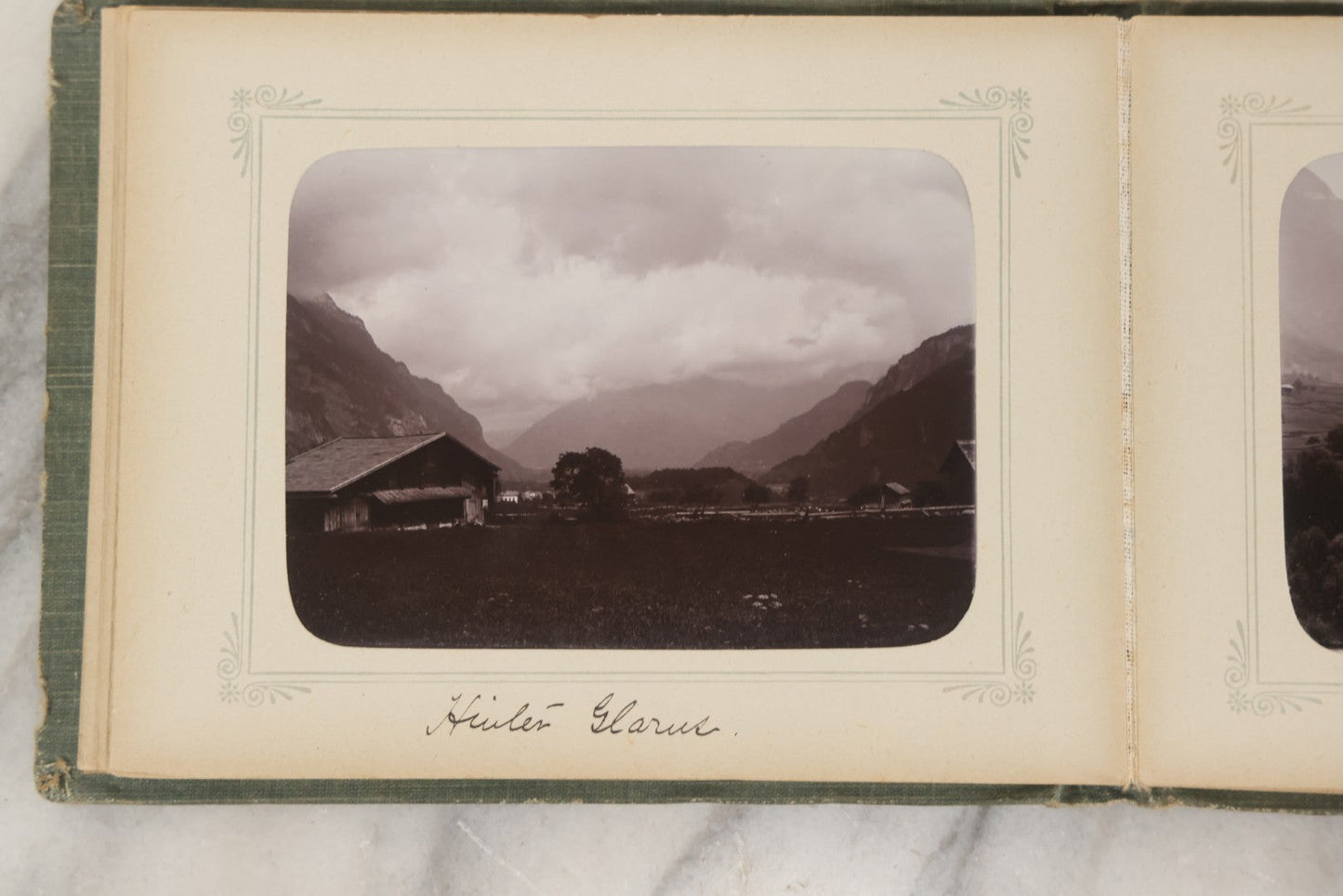 Lot 161 - "Photographien" Antique European Travel Photo Album, Green Hardcover With Black Plaid Stripe Design, Inscribed 1903, Containing Travel Photographs Of Switzerland With Captions