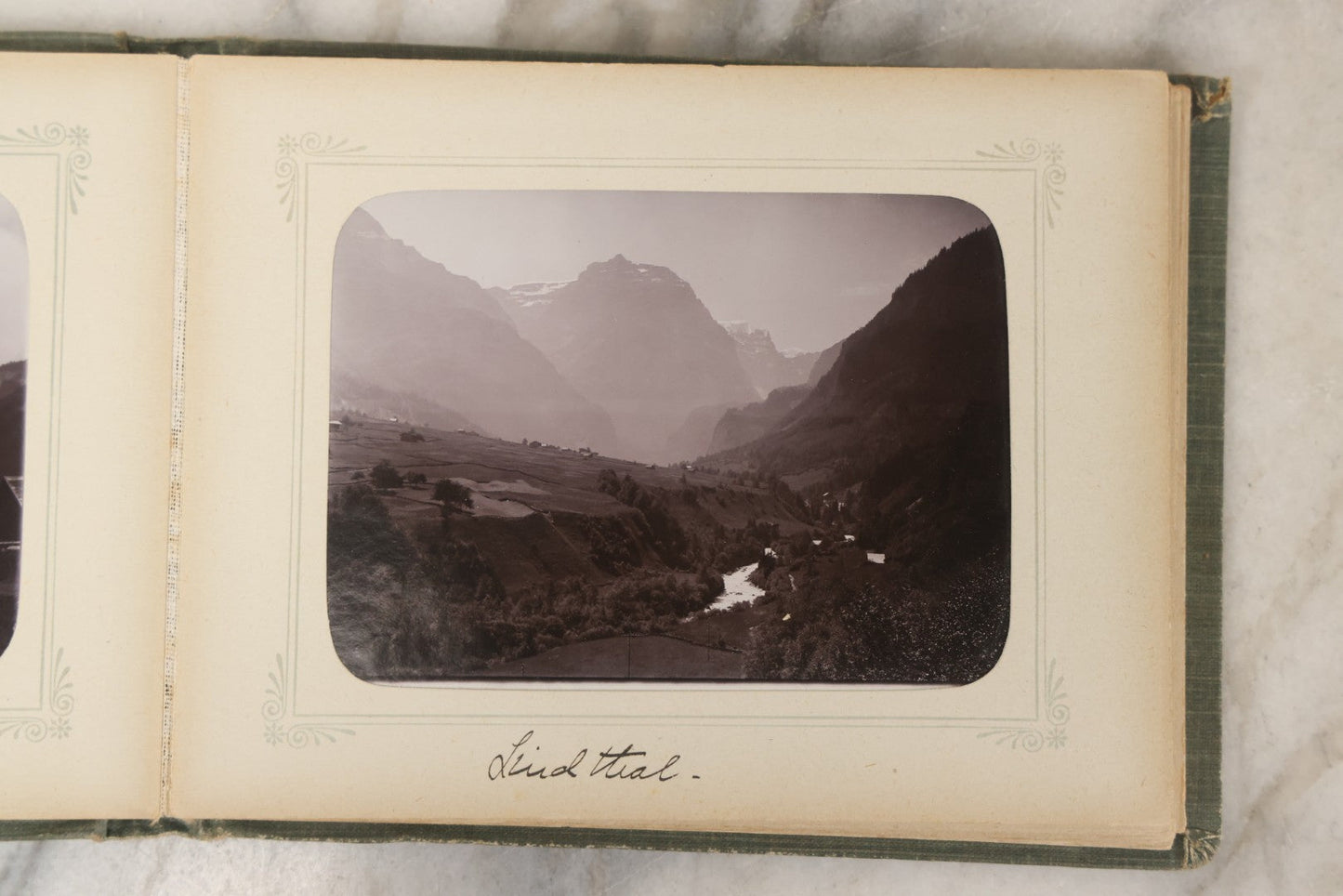 Lot 161 - "Photographien" Antique European Travel Photo Album, Green Hardcover With Black Plaid Stripe Design, Inscribed 1903, Containing Travel Photographs Of Switzerland With Captions