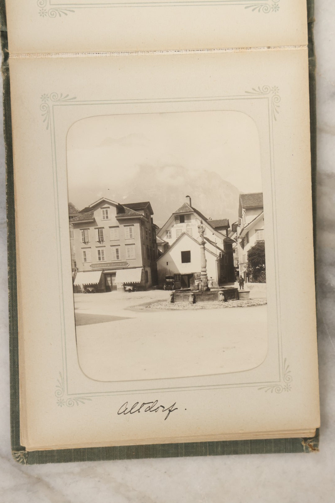 Lot 161 - "Photographien" Antique European Travel Photo Album, Green Hardcover With Black Plaid Stripe Design, Inscribed 1903, Containing Travel Photographs Of Switzerland With Captions