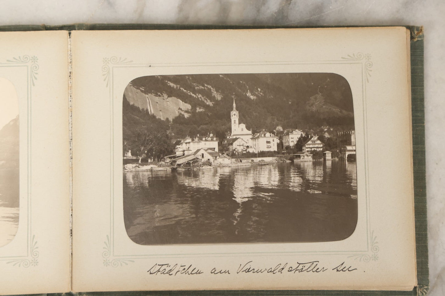 Lot 161 - "Photographien" Antique European Travel Photo Album, Green Hardcover With Black Plaid Stripe Design, Inscribed 1903, Containing Travel Photographs Of Switzerland With Captions