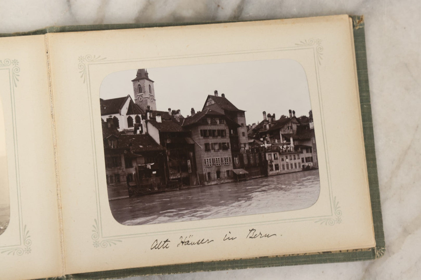 Lot 161 - "Photographien" Antique European Travel Photo Album, Green Hardcover With Black Plaid Stripe Design, Inscribed 1903, Containing Travel Photographs Of Switzerland With Captions