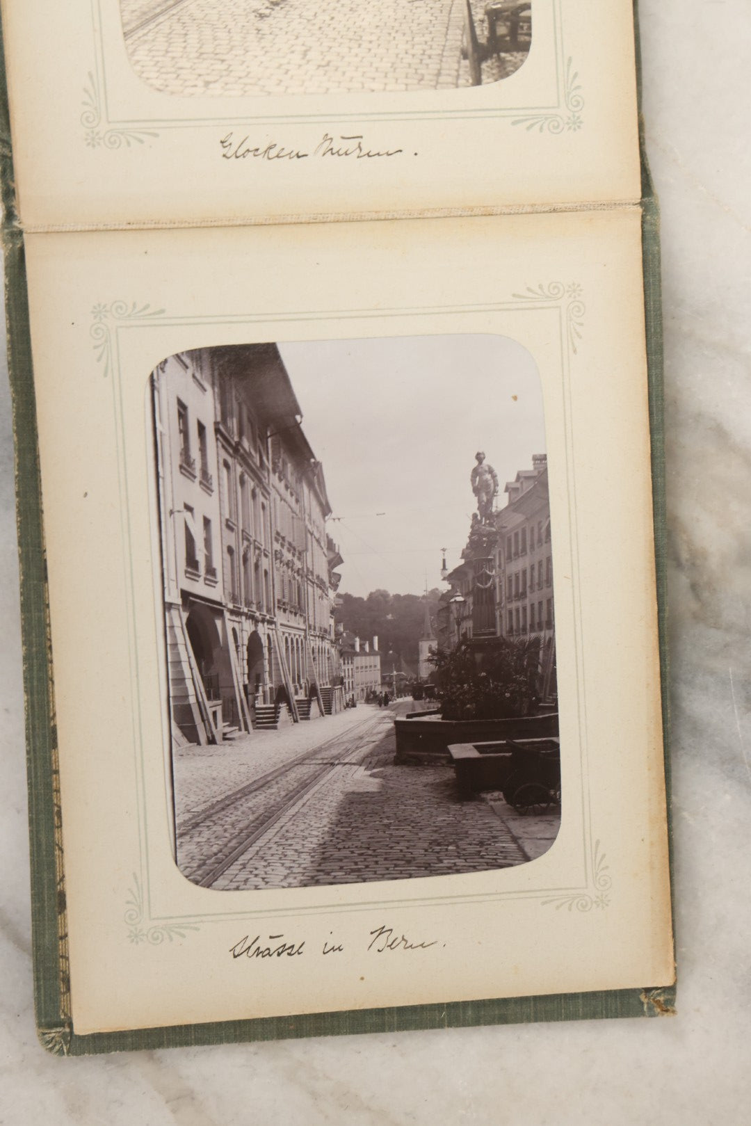 Lot 161 - "Photographien" Antique European Travel Photo Album, Green Hardcover With Black Plaid Stripe Design, Inscribed 1903, Containing Travel Photographs Of Switzerland With Captions