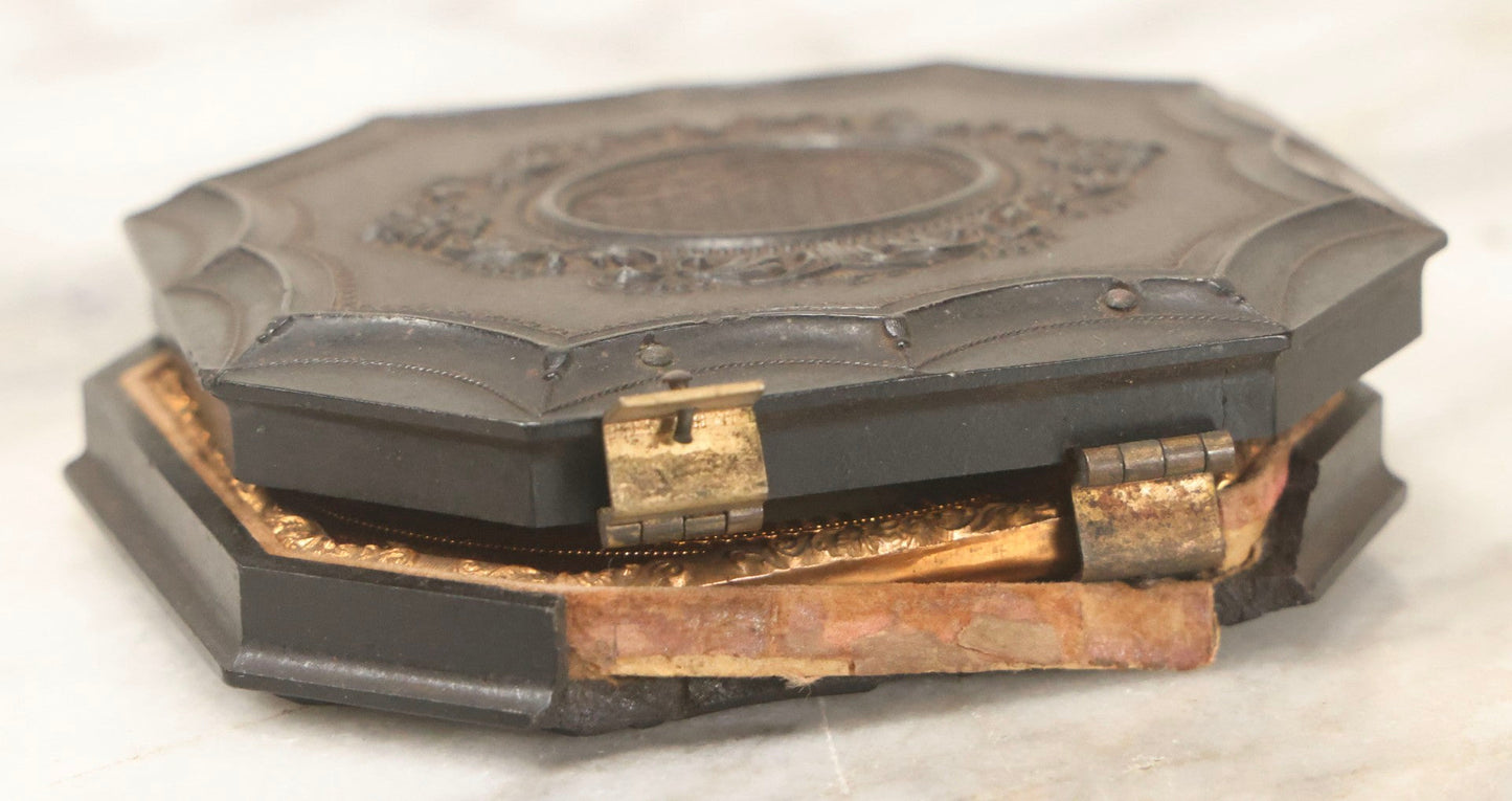 Lot 163 - Pair Of Antique 1/6th Plate Ambrotype Photographs Of Man And Woman Holding Books In Double Sided Thermoplastic Union Case, Note Damage