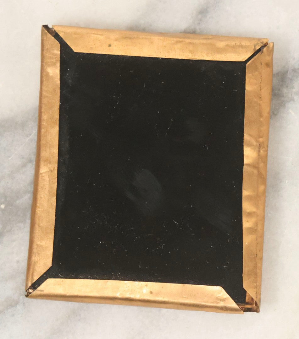 Lot 165 - Grouping Of Three Antique Portrait Photographs, One Tintype Of A Young Man, Two Ruby Ambrotypes In Brass Mats Including Young Woman With Hand-Painted Jewelry And Young Man In Bowtie