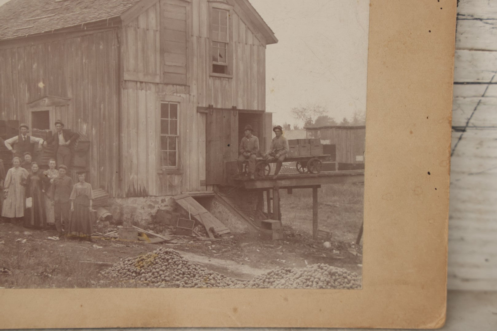 Lot 167 - Antique Boarded Occupational Photograph Of Farm Workers With Apple Harvest, Bad River Reservation, Northern Wisconsin