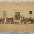 Lot 168 - Antique Boarded Photograph Of Large School Class With Teachers Before Schoolhouse, Numbered And Annotated On Verso