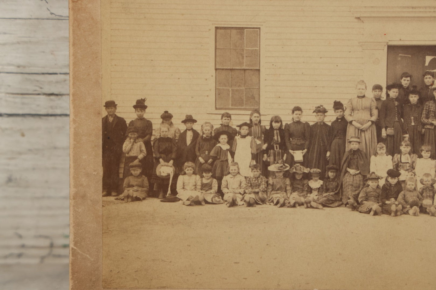 Lot 168 - Antique Boarded Photograph Of Large School Class With Teachers Before Schoolhouse, Numbered And Annotated On Verso