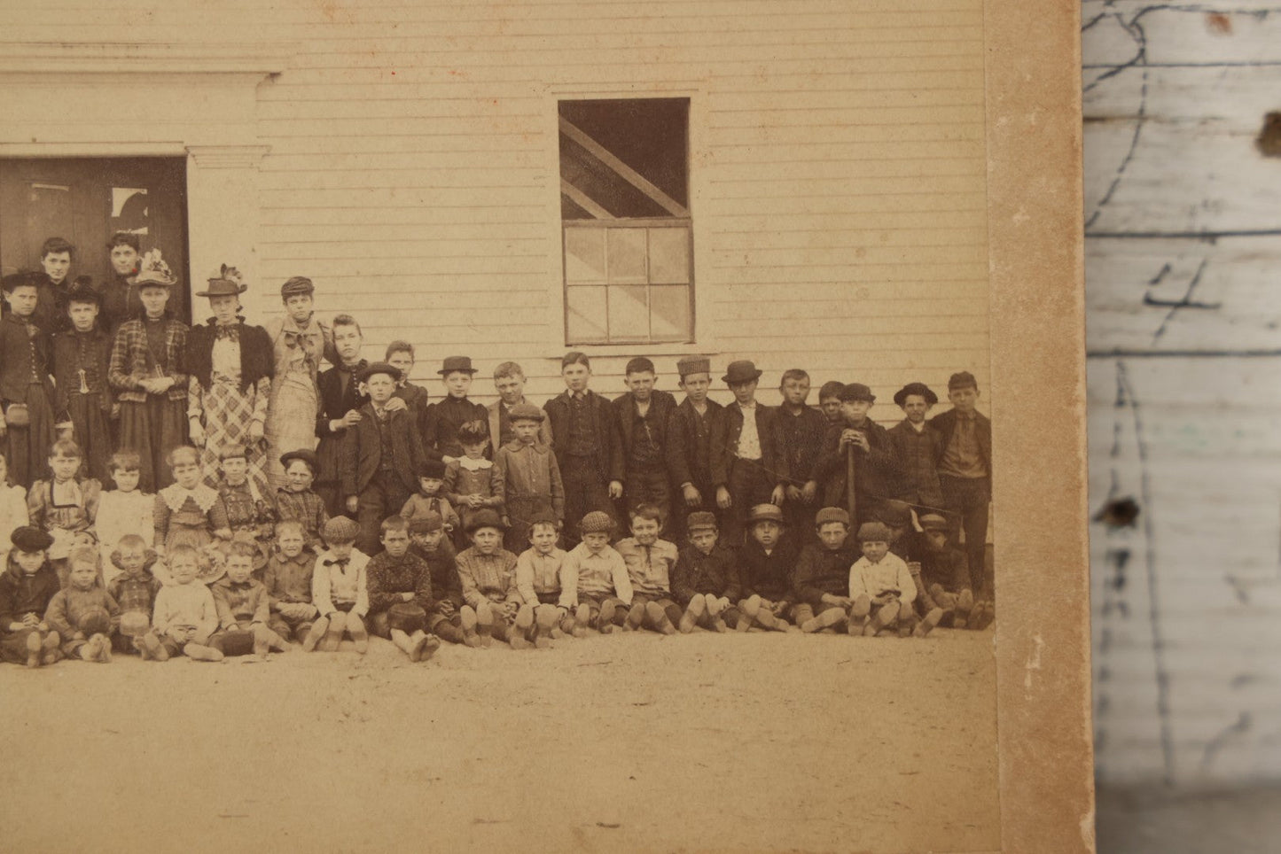 Lot 168 - Antique Boarded Photograph Of Large School Class With Teachers Before Schoolhouse, Numbered And Annotated On Verso