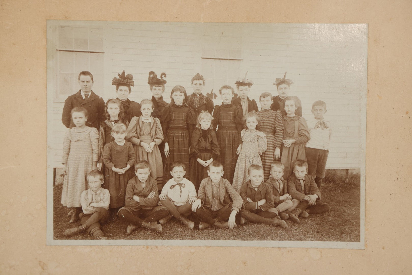Lot 169 - Antique Boarded Photograph Of Small School Class With Boys, Girls, And Teachers Wearing Elaborate Hats