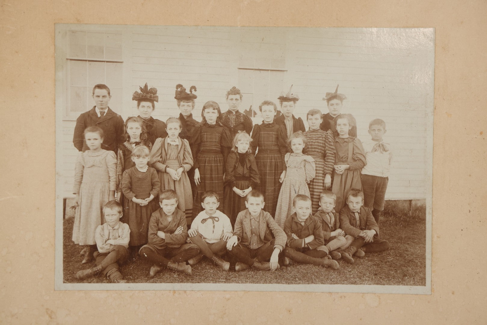 Lot 169 - Antique Boarded Photograph Of Small School Class With Boys, Girls, And Teachers Wearing Elaborate Hats