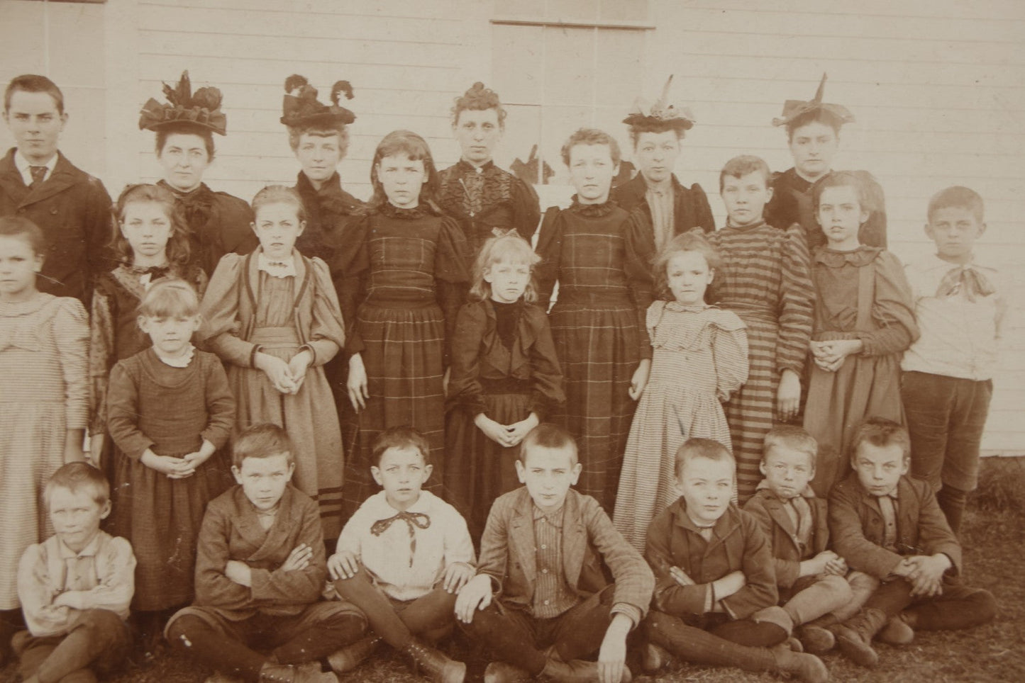 Lot 169 - Antique Boarded Photograph Of Small School Class With Boys, Girls, And Teachers Wearing Elaborate Hats