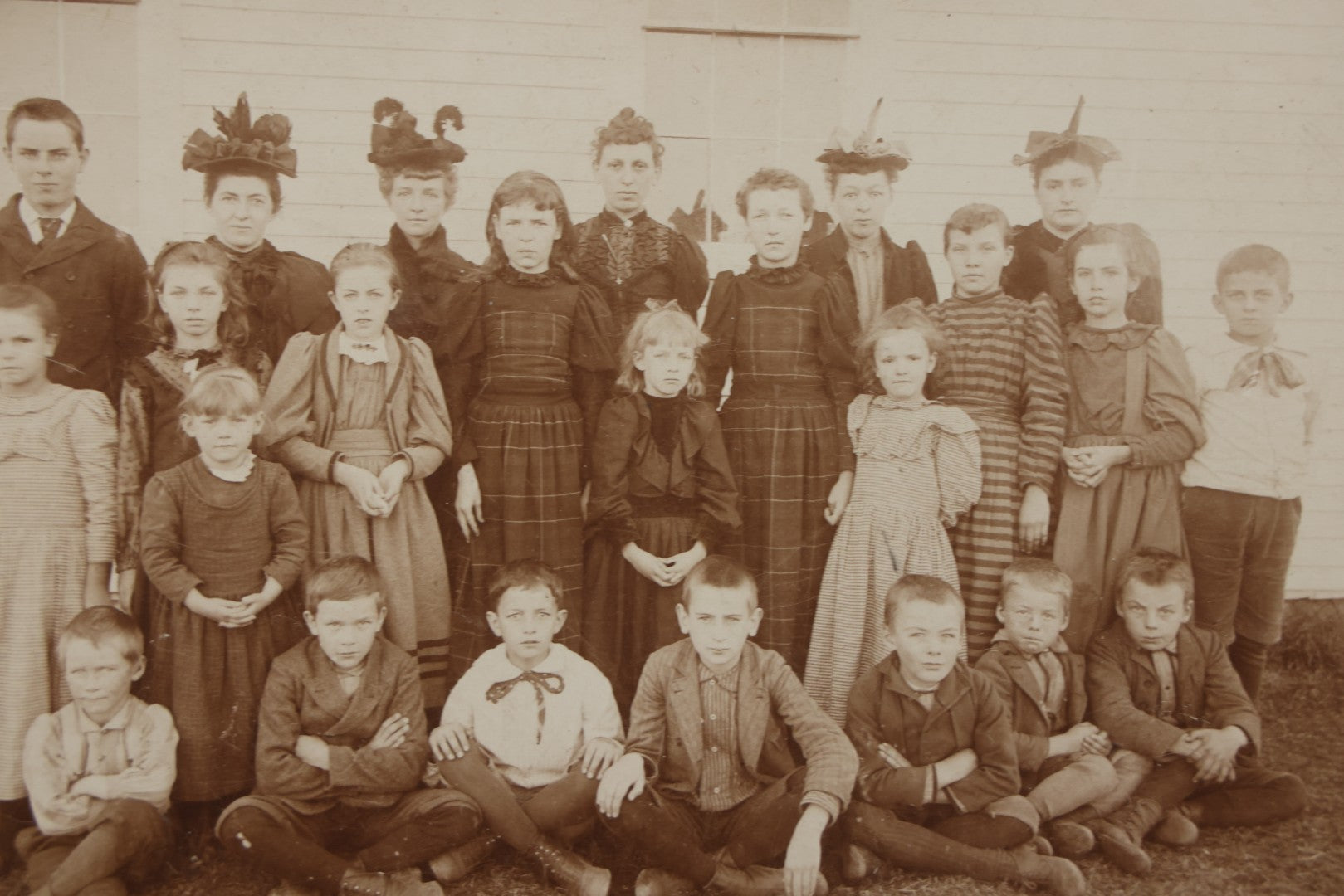 Lot 169 - Antique Boarded Photograph Of Small School Class With Boys, Girls, And Teachers Wearing Elaborate Hats