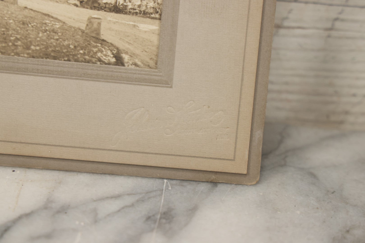 Lot 173 - Grouping Of Four Antique Photographs In Paper Slip Frames Depicting Memorial Road And Surroundings, Photographed By Johnson Studios, East Jaffrey, New Hampshire