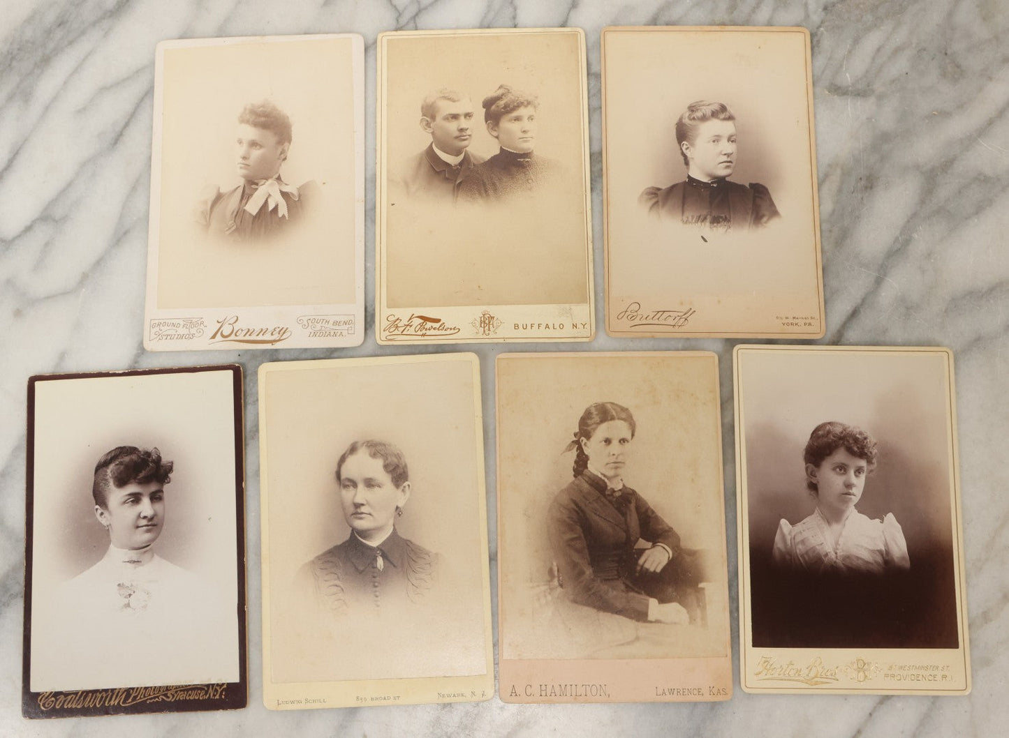 Lot 176 - Grouping Of Seven Antique Cabinet Card Photographs Of Victorian Women, Various Photographers And Locations