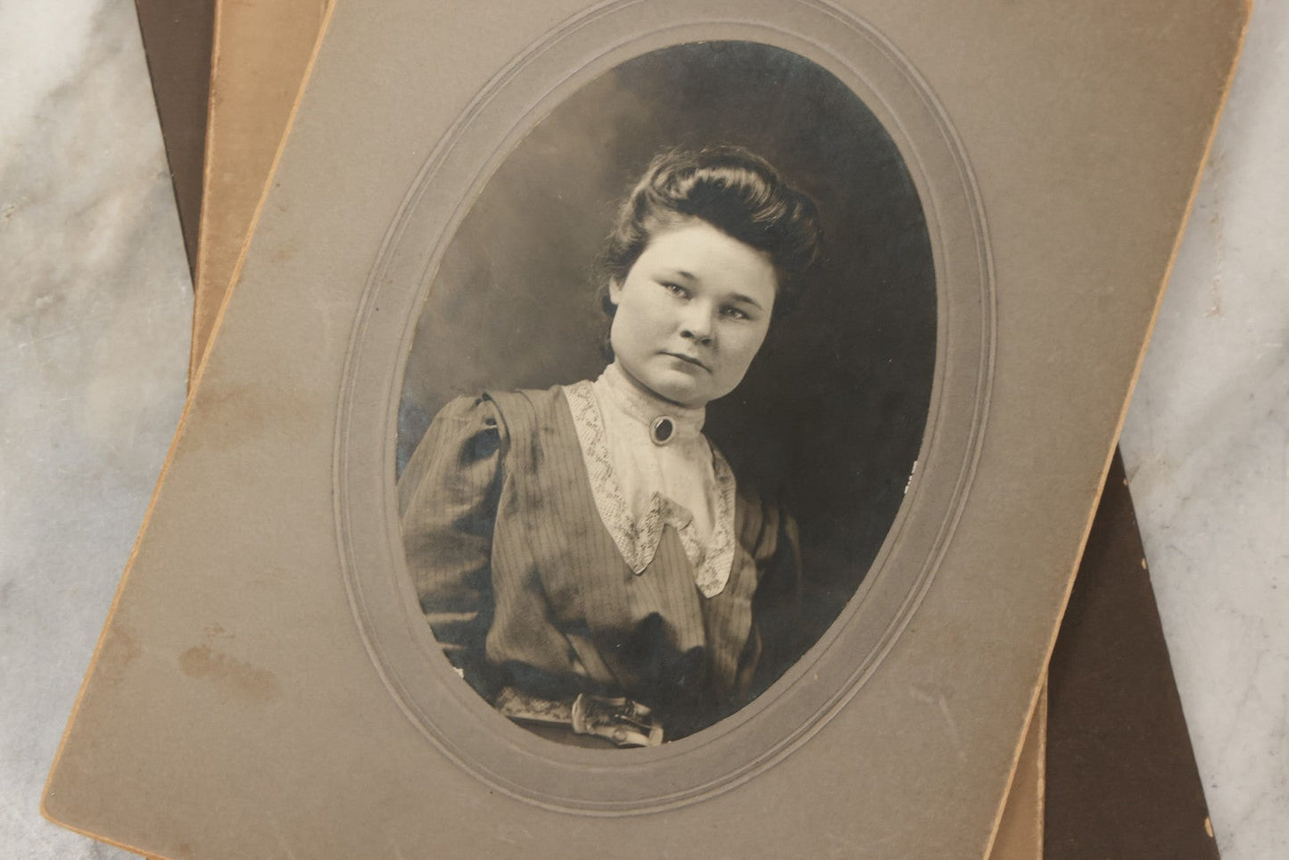 Lot 177 - Grouping Of Twelve Antique Photographs, Mostly Boarded, Including Wedding, Children, And Women Portraits, Circa 1880–1900